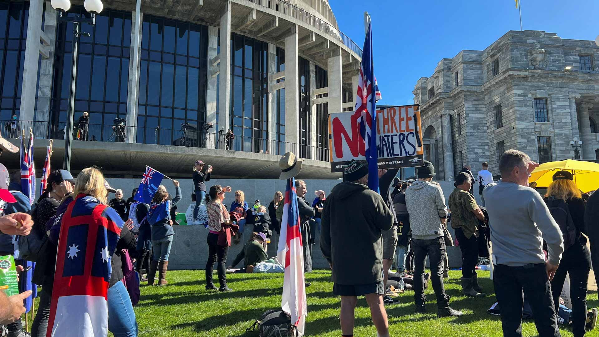 Image for the title: Anti-government protesters gather outside NZ's parliament 