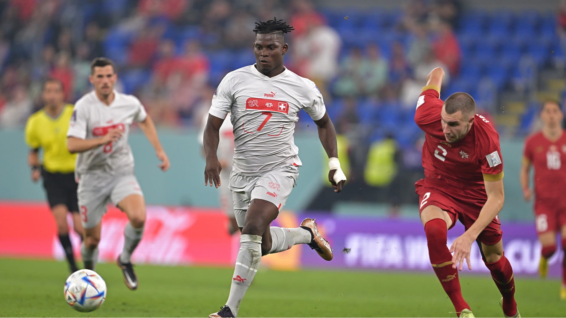 Image for the title: Switzerland beat Serbia 3-2 to reach World Cup last 16 