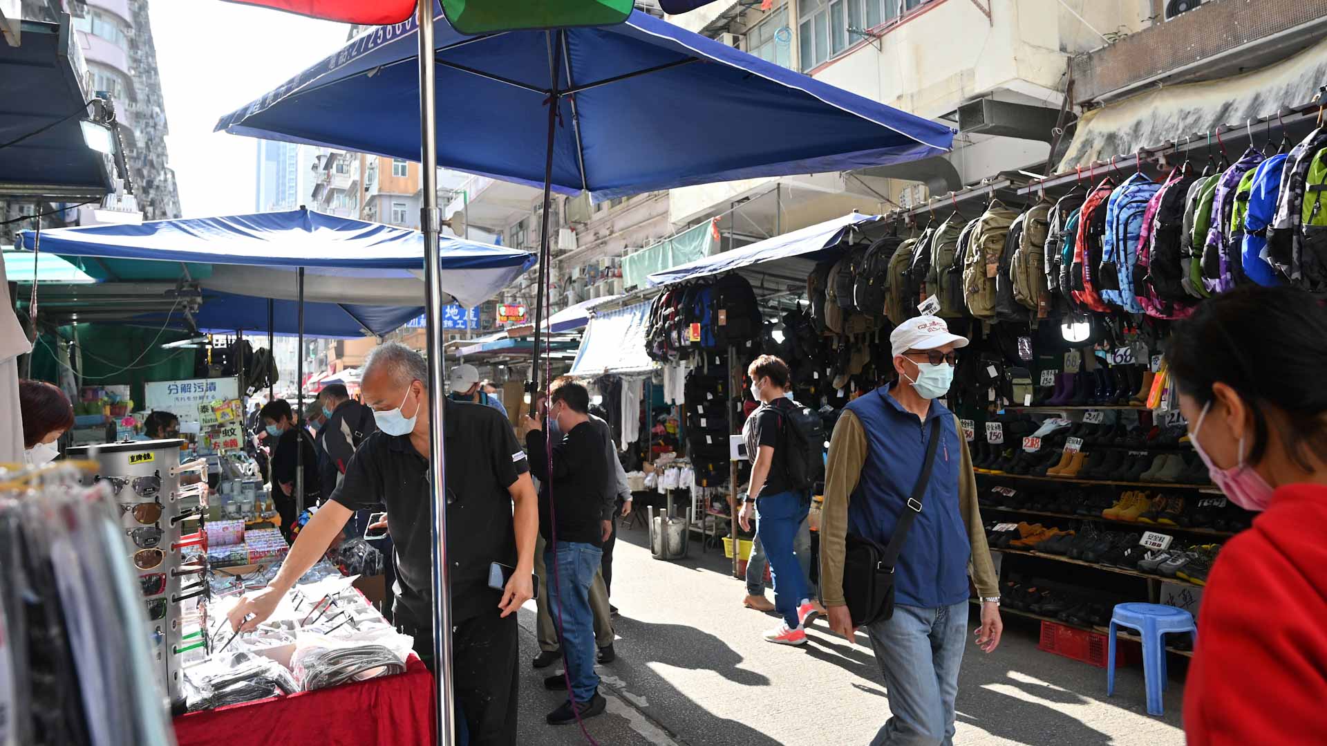 Image for the title: China eases curbs, but full zero-COVID exit is still a ways off 