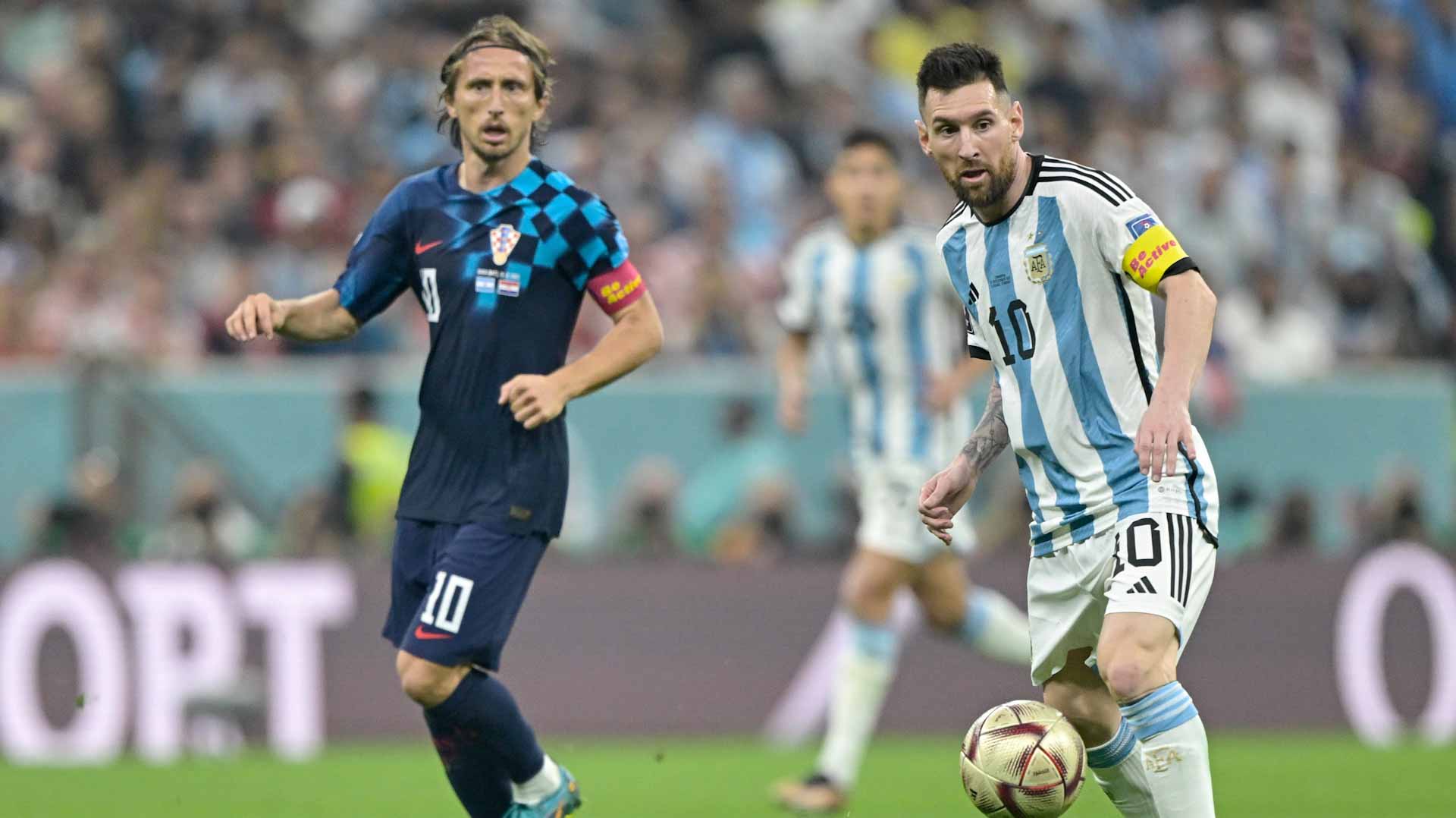 Image for the title: Messi leads Argentina to World Cup final in 3-0 win over Croatia 
