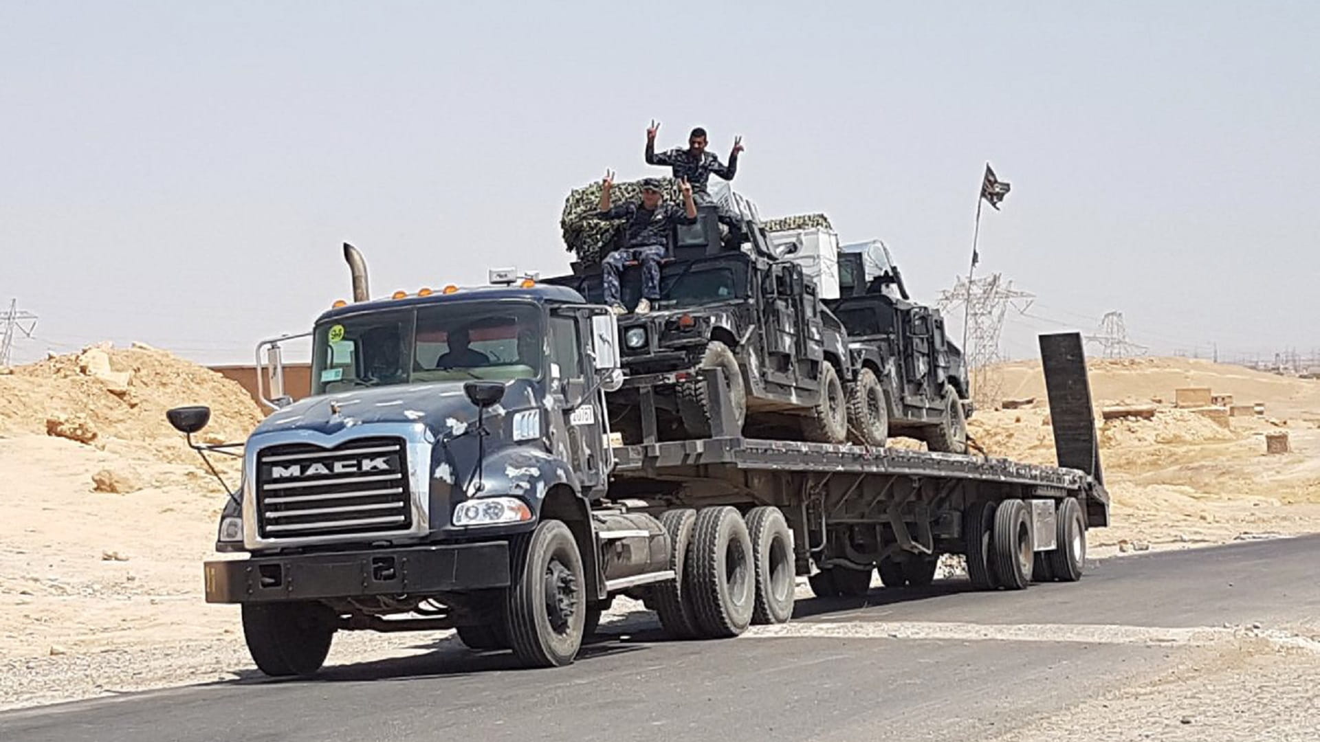 صورة بعنوان: مقتل وإصابة 11 شرطياً عراقياً في تفجير عبوة ناسفة قرب كركوك 