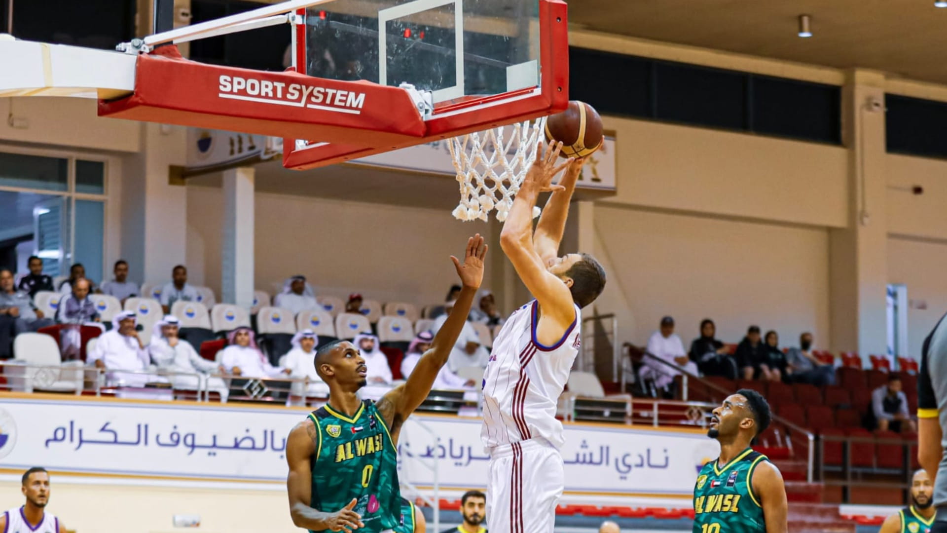 Image for the title: Sharjah maintains the lead in the Basketball League 