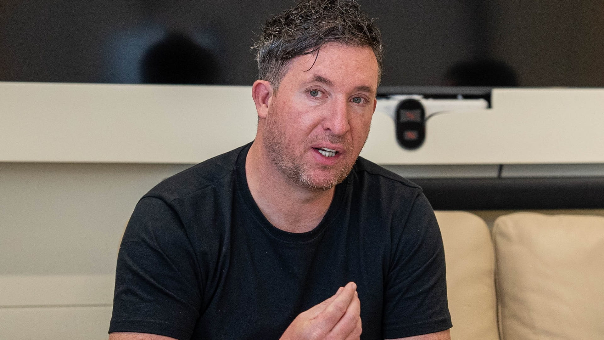 Image for the title: Al Hazami meets Liverpool legend Robbie Fowler 