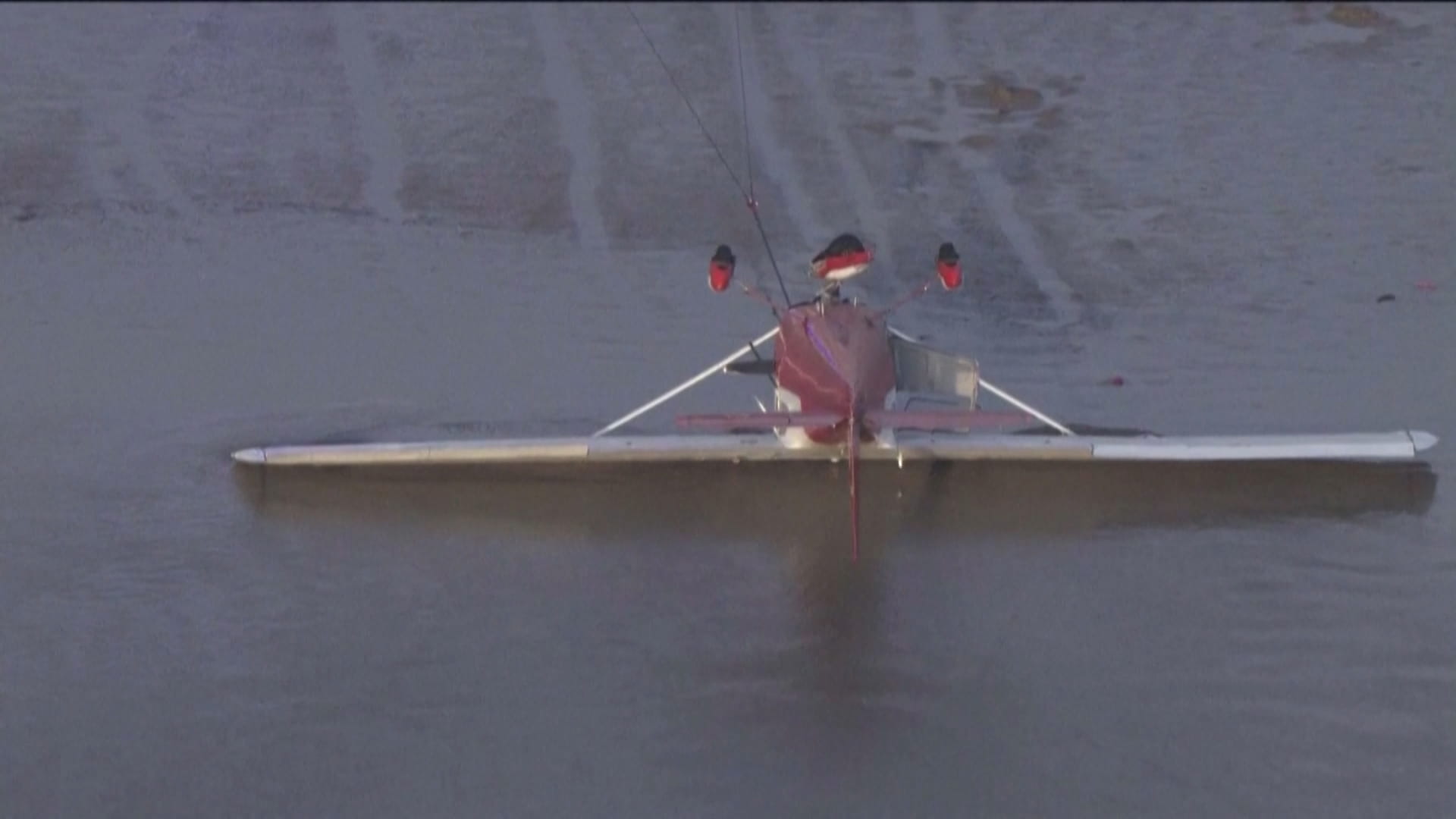 Image for the title: One dead as plane crash-lands on California beach 