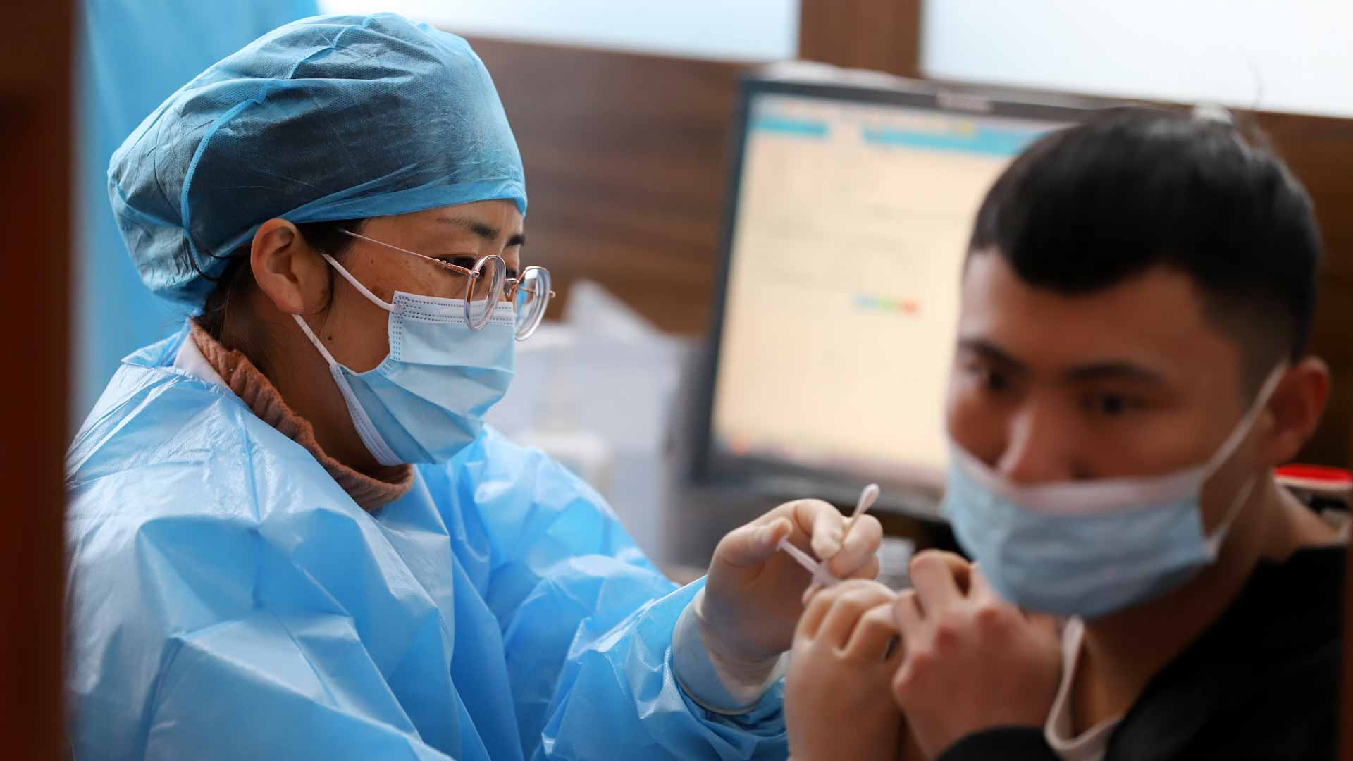 Image for the title: China reports 39 new COVID cases for Feb 2 vs 63 a day earlier 