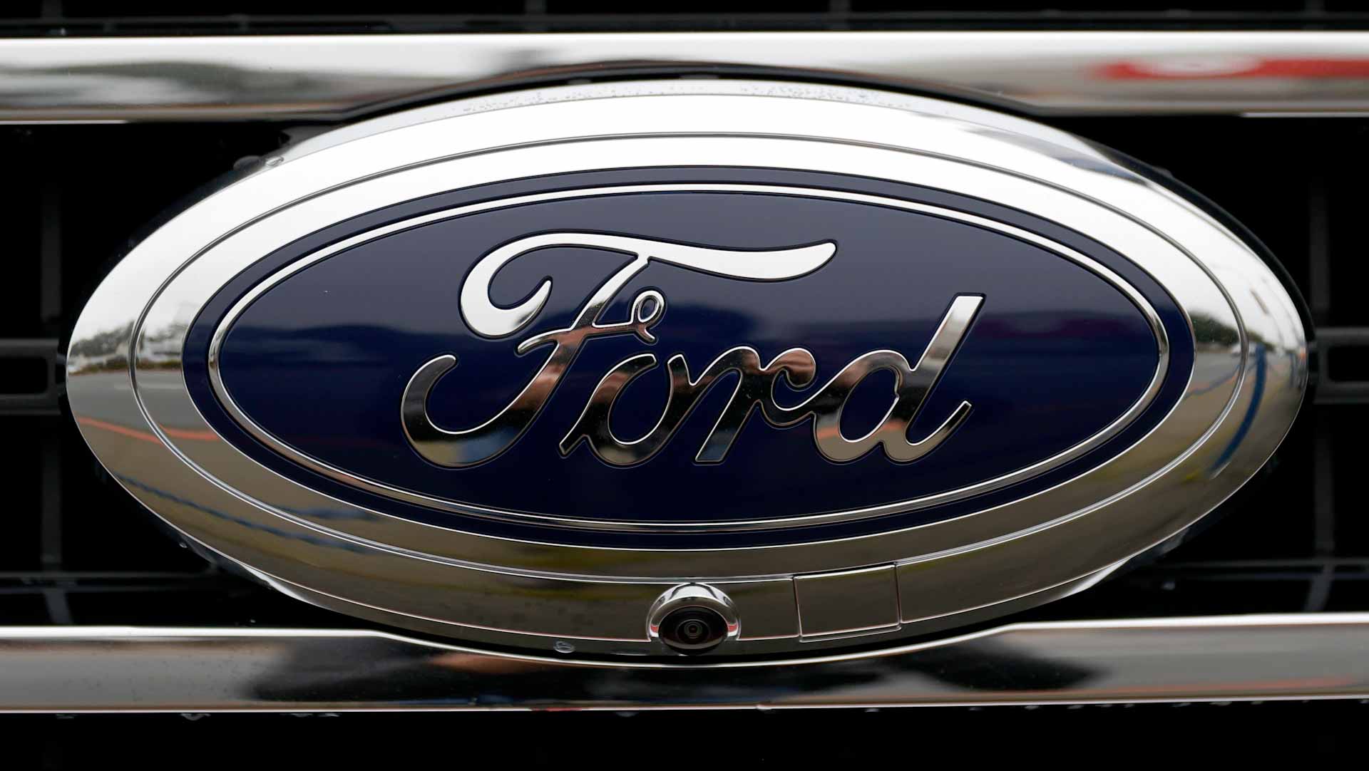 Image for the title: Ford Q4 profits hit by supply chain woes 