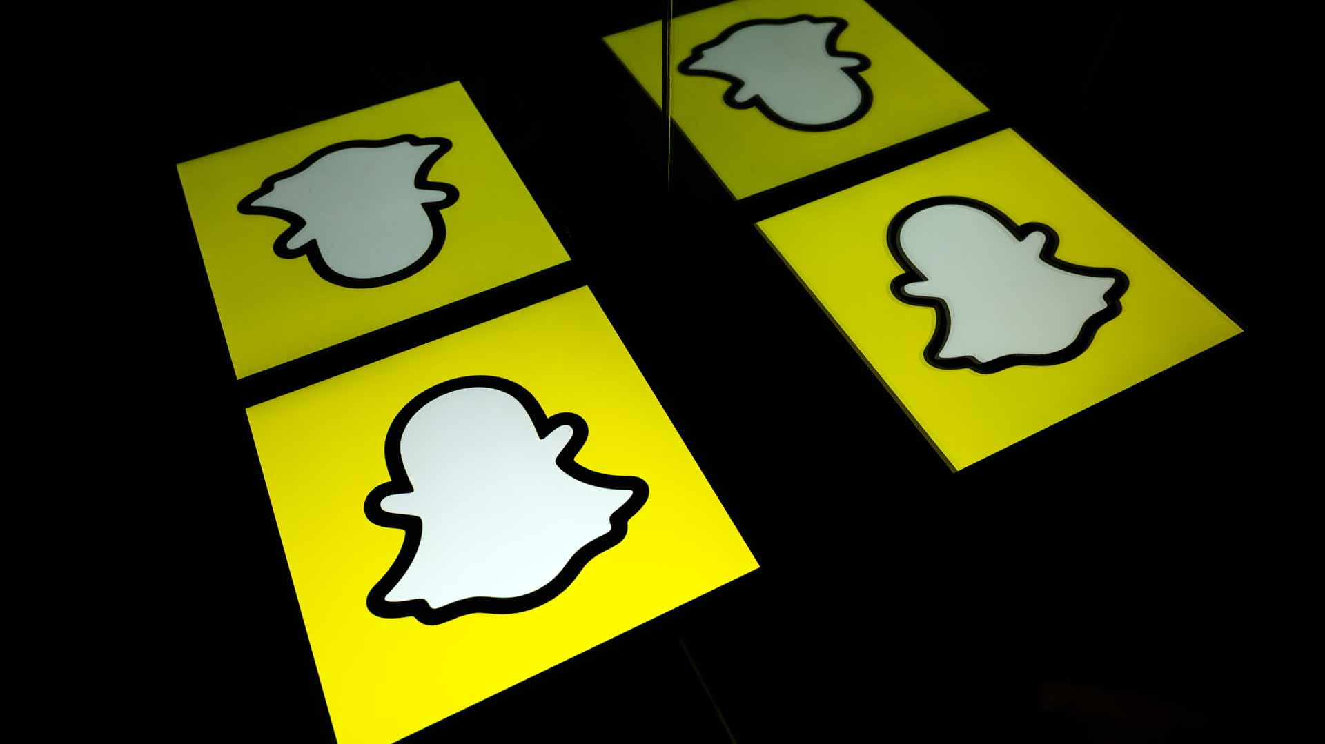Image for the title: Snapchat parent shares soar on first quarterly profit 