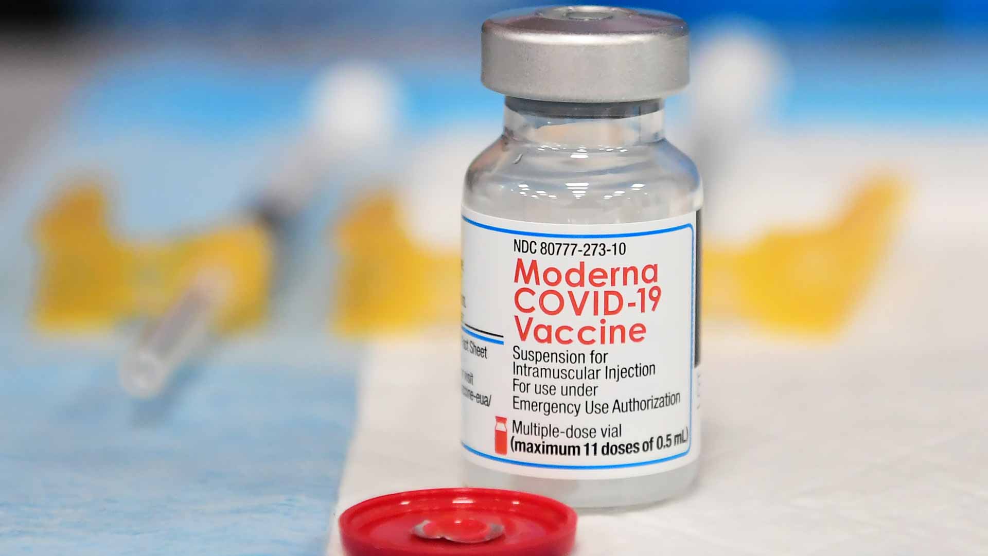 Image for the title: U.S. CDC backs full approval of Moderna's COVID-19 vaccine 