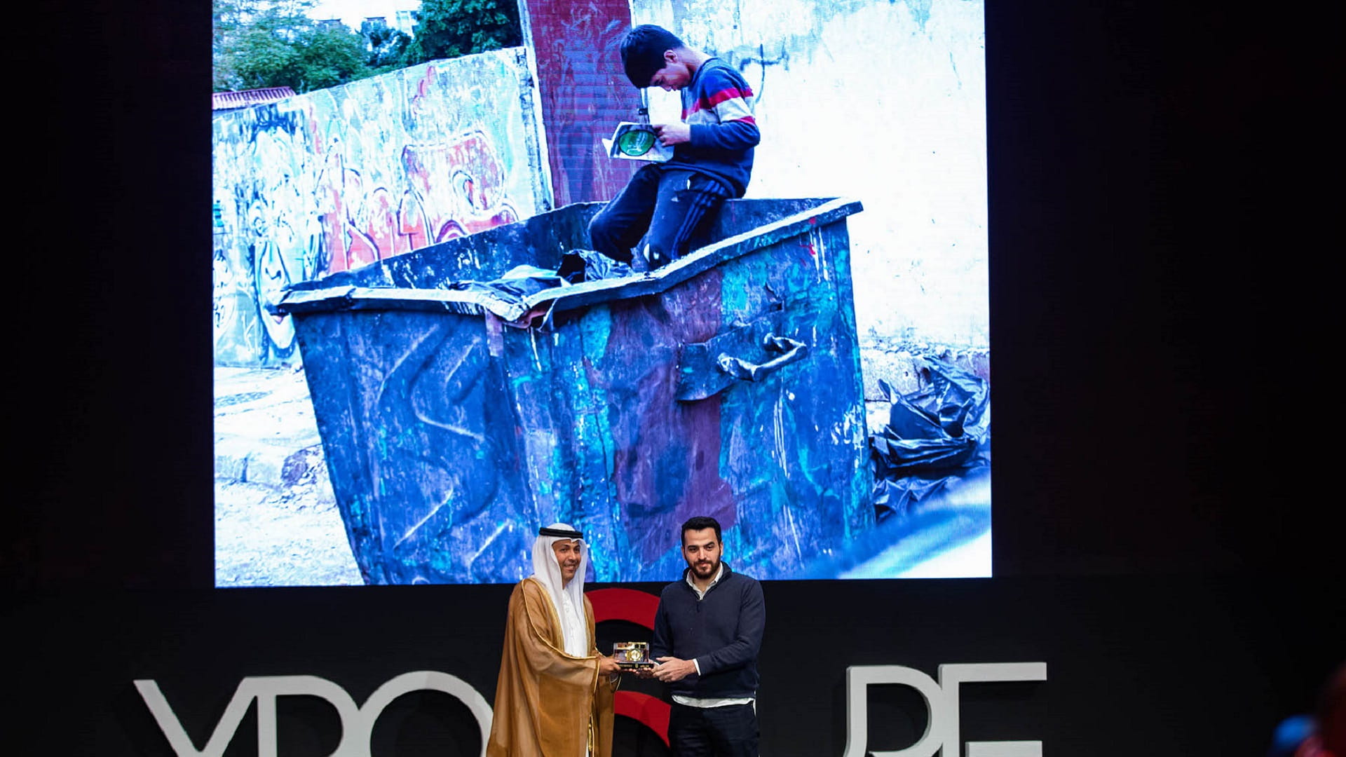 Image for the title: Xposure 2022 sponsors refugee child's education with TBHF 