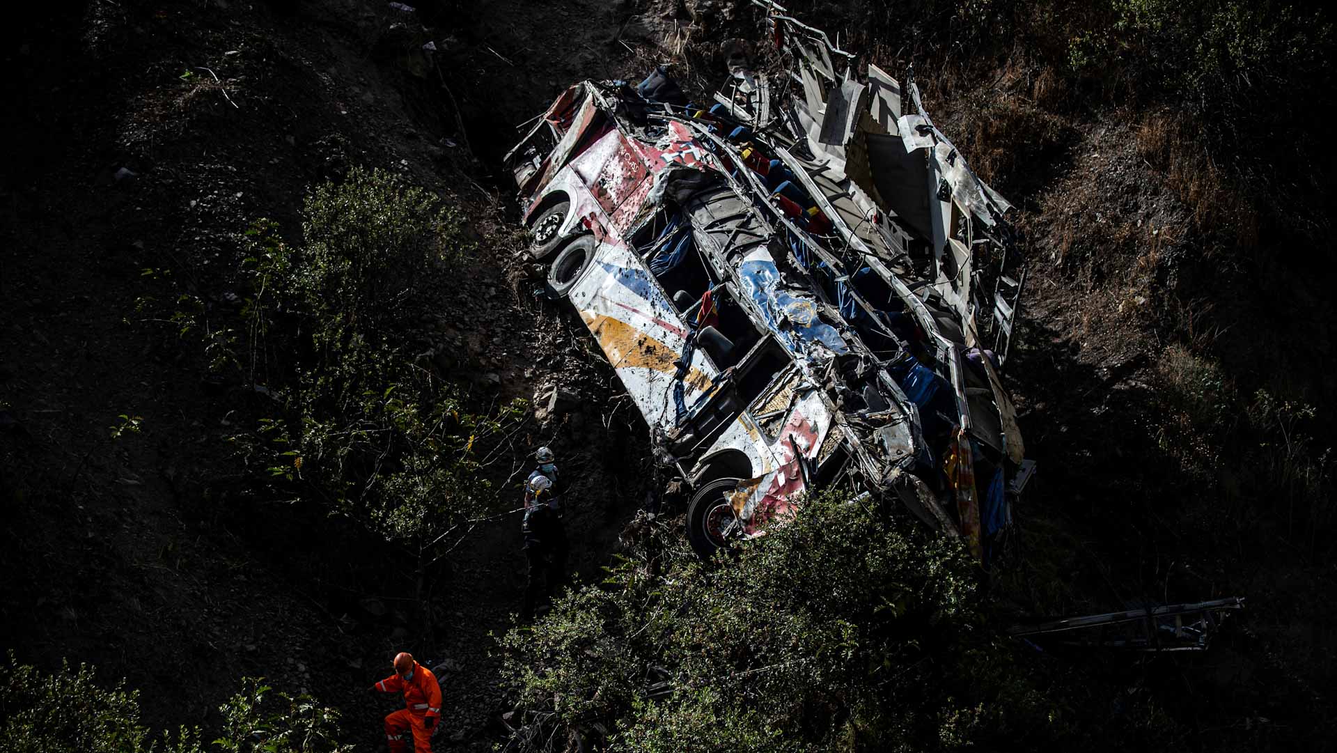 Image for the title: At least 20 dead, 30 injured in Peru bus crash 