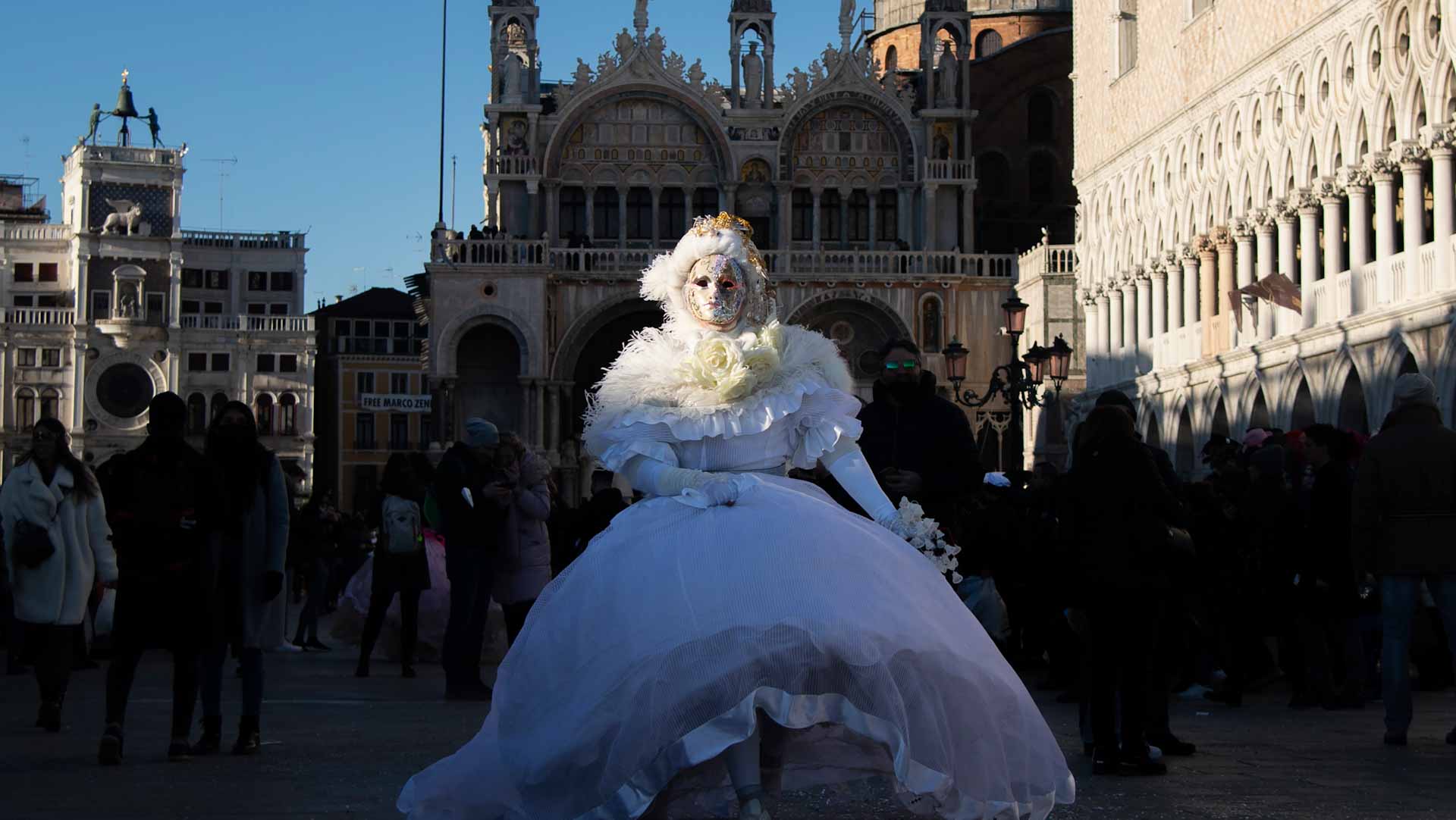 Image for the title: Venice's 'Carnival of hope' kicks off as COVID worries ease 