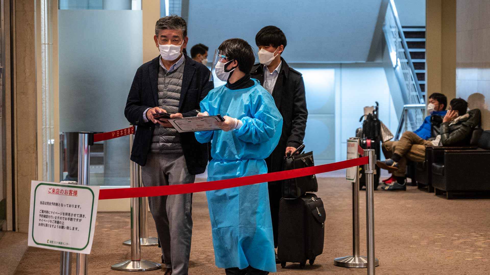 Image for the title: Japan set to announce easing of strict border measures 