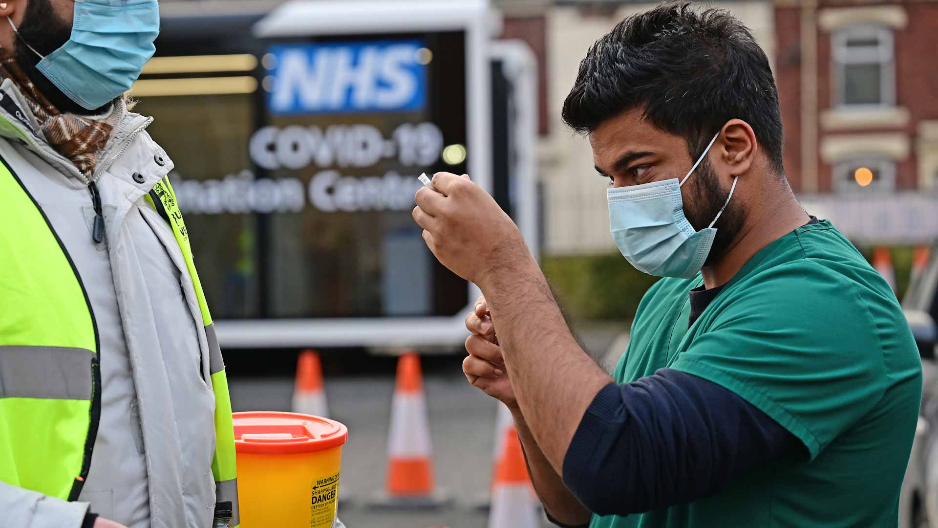 Image for the title: UK reports 34,377 new COVID-19 cases, 128 deaths 