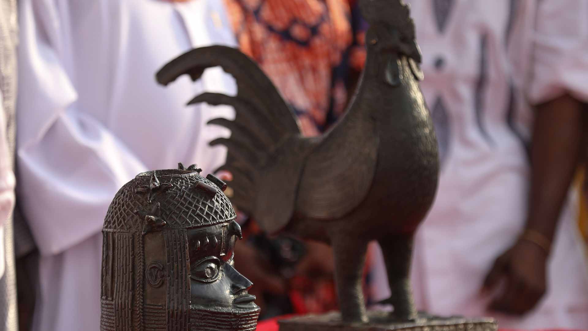 Image for the title: Nigeria returns two looted treasures to traditional palace 