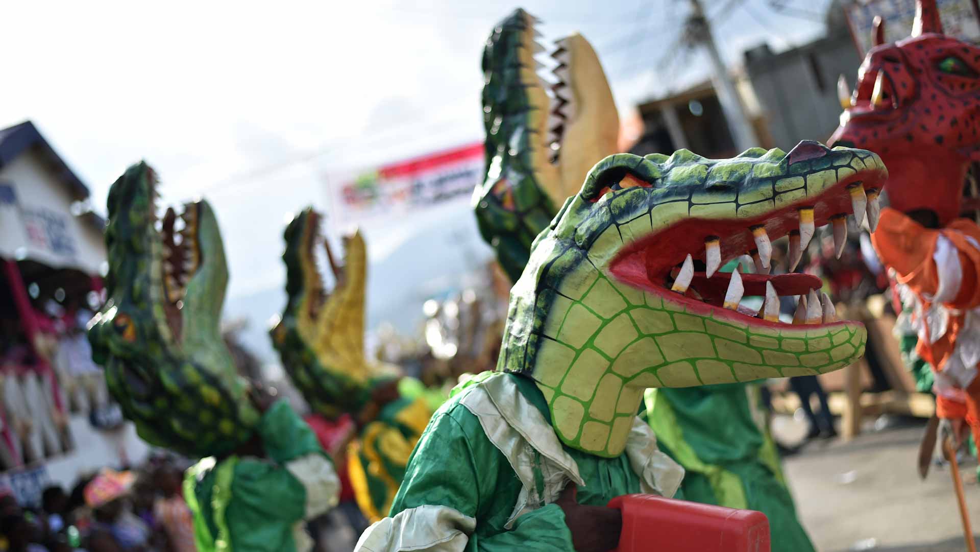 Image for the title: Haitian carnival takes to streets with dance despite crises 