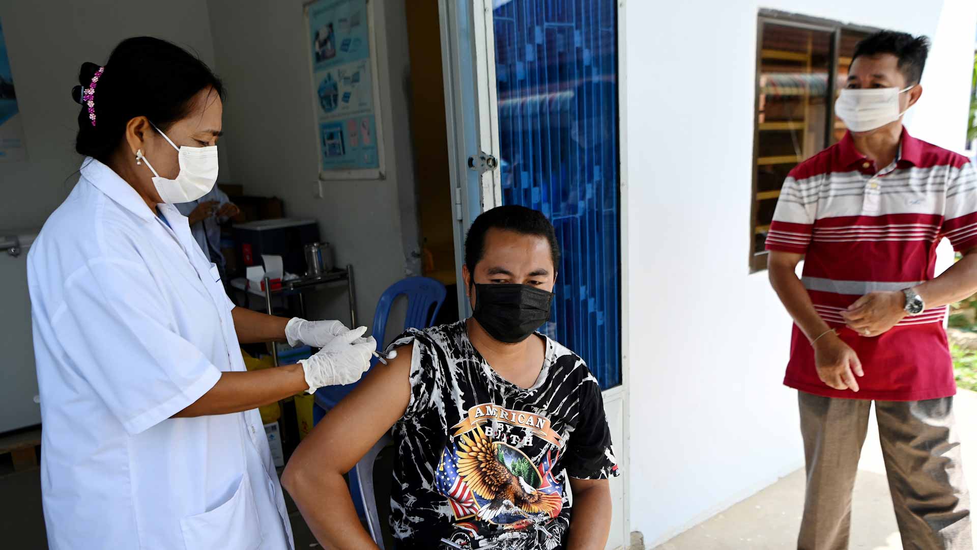 Image for the title: Canada approves first domestic Covid-19 vaccine 