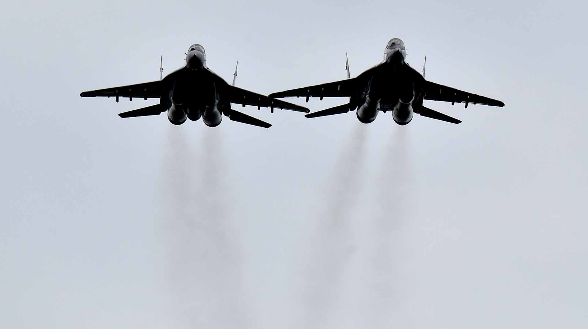 Image for the title: Town near Ukraine's Kyiv hit by missiles, oil terminal on fire 