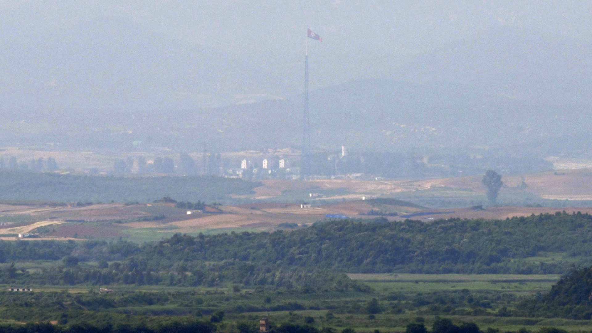 Image for the title: South Korean crosses armed border in rare defection to North 
