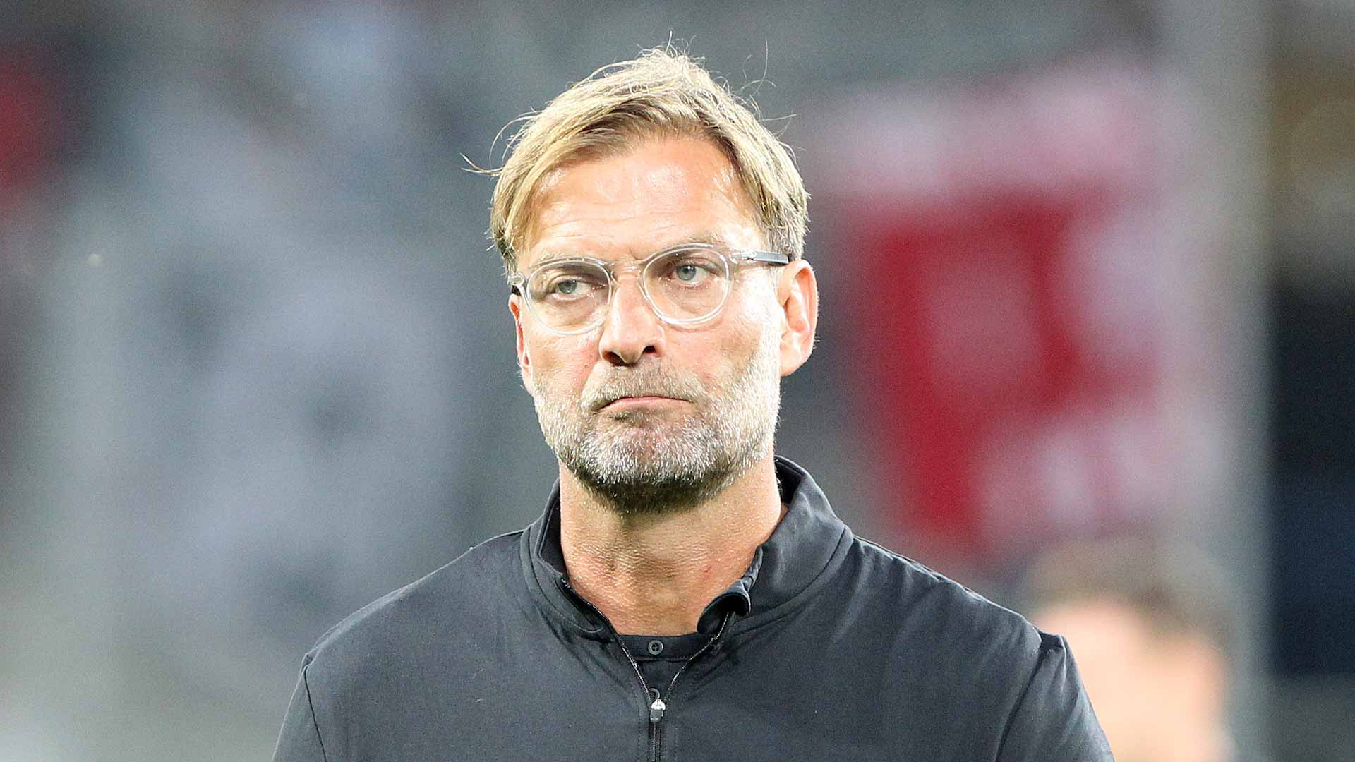 Image for the title: Liverpool boss Klopp to miss Chelsea game due to COVID-19 