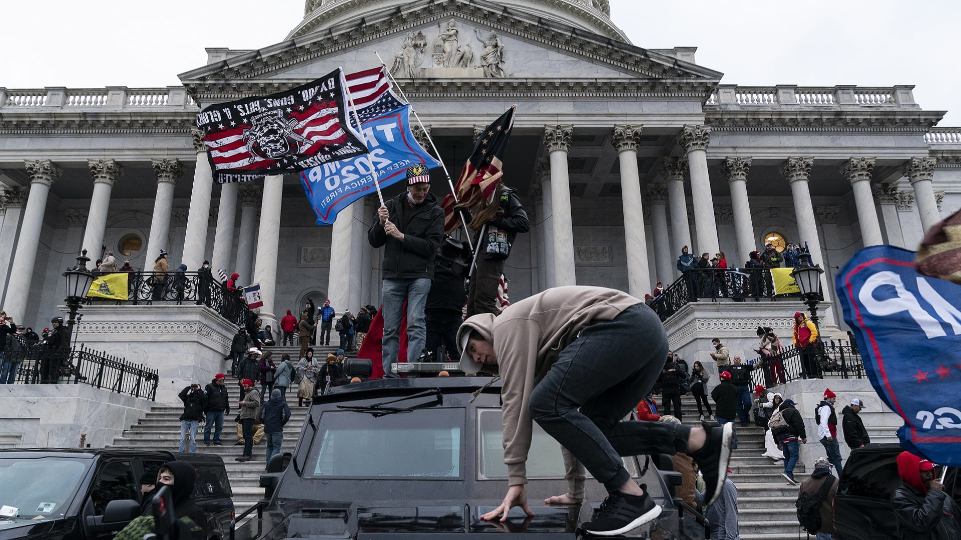 Image for the title: A year after Capitol riot, Americans fear for their democracy 