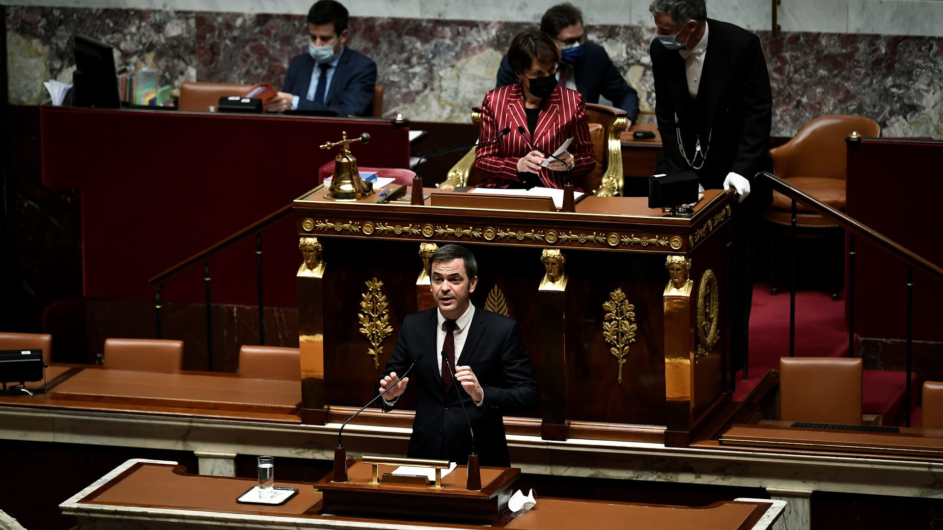 Image for the title: France moves towards vaccine pass to fight Omicron 'tidal wave' 