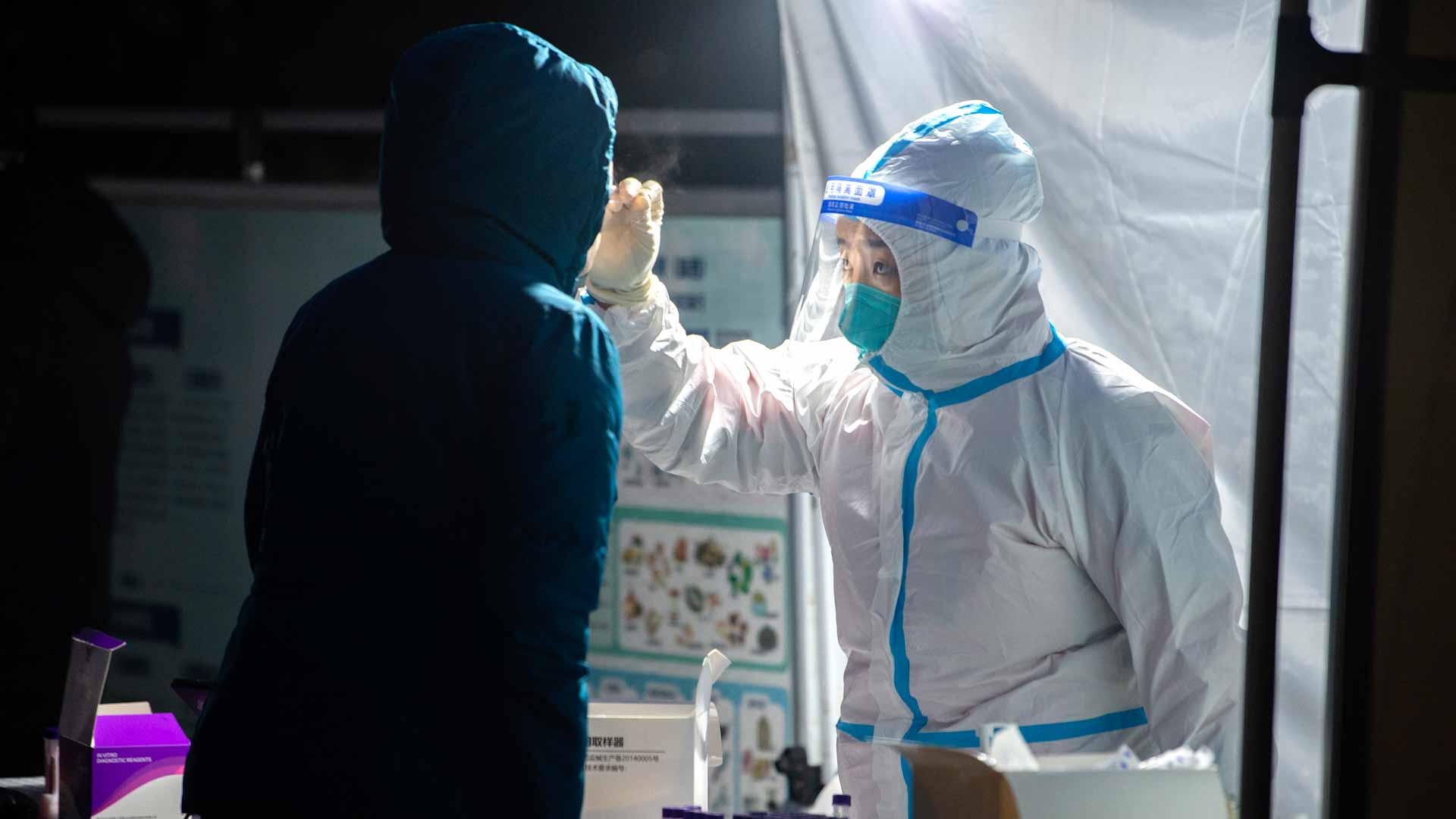 Image for the title: China locks down city of 1.2 million after three virus cases 