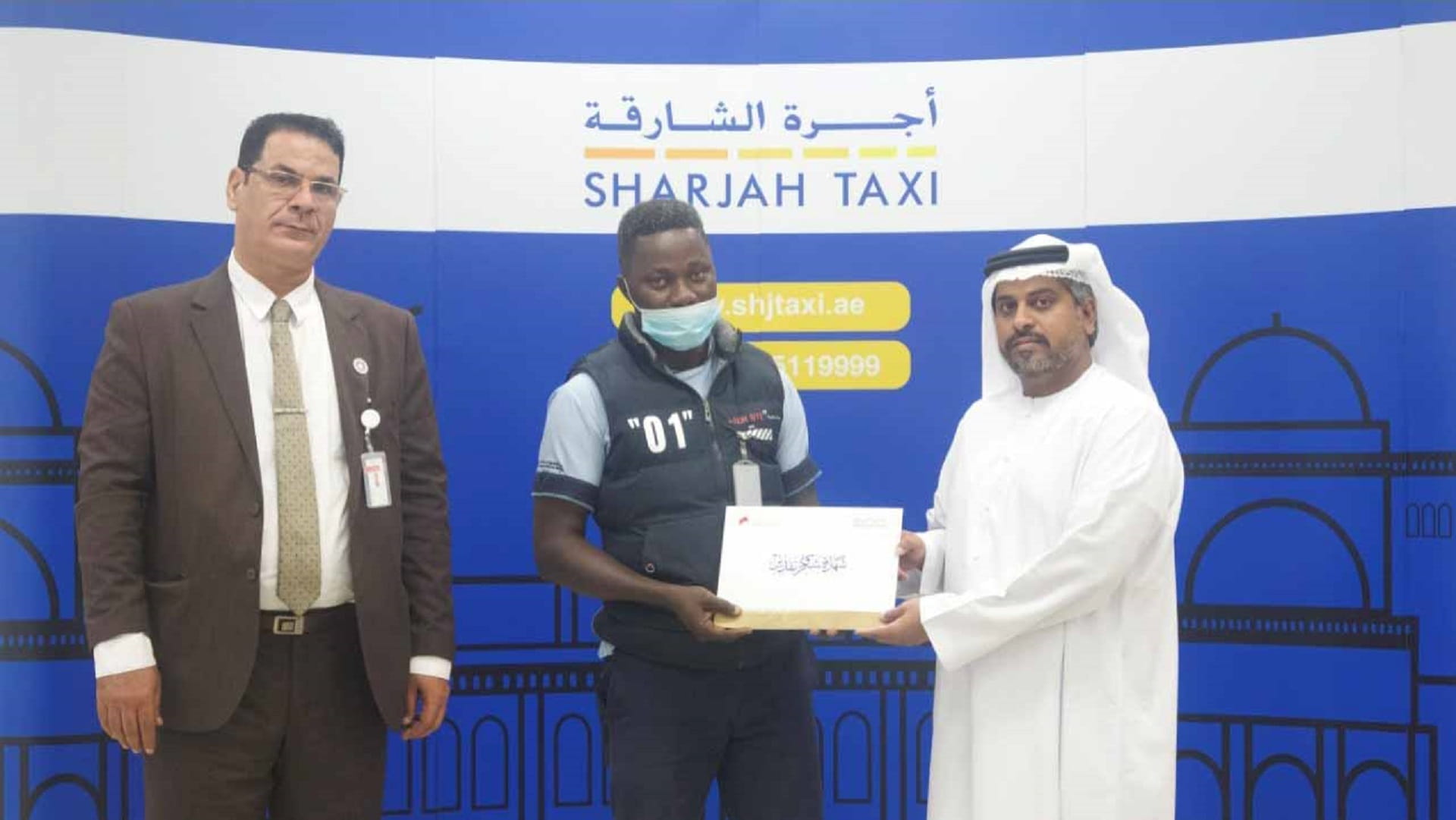 Image for the title: Sharjah Taxi honors driver for returning AED100,000  