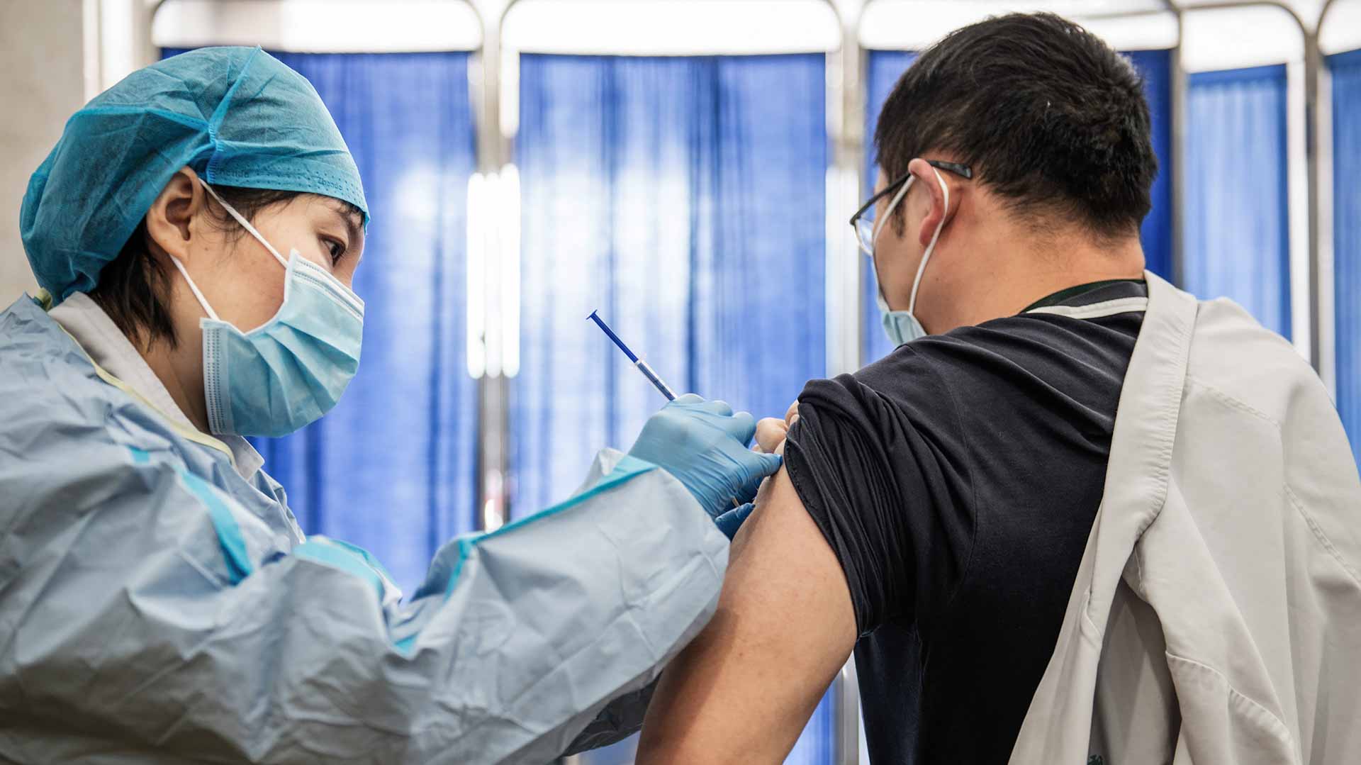 Image for the title: China's Henan imposes more COVID curbs as cases spike 