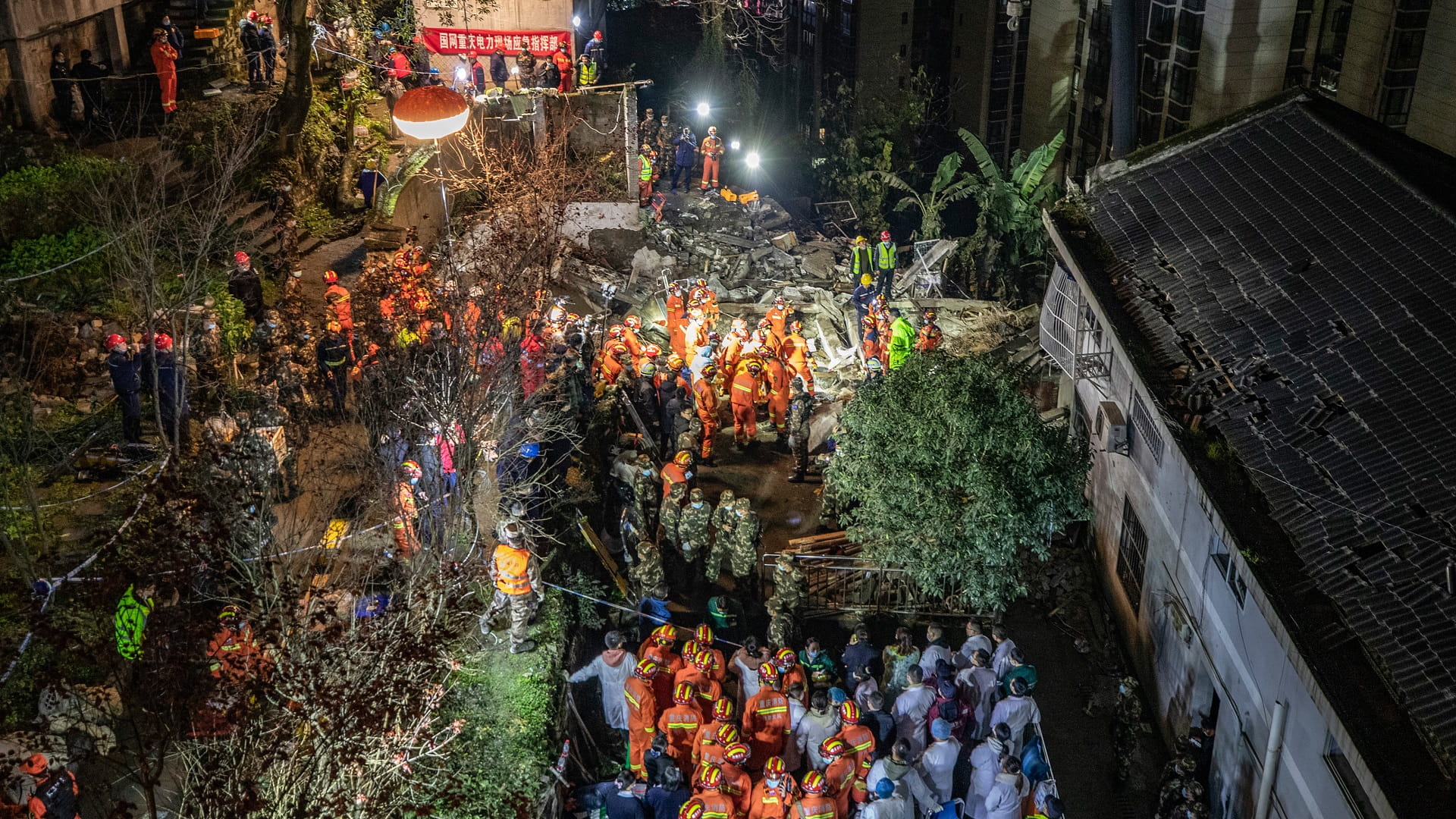 Image for the title: At least 6 dead in SW China building collapse 
