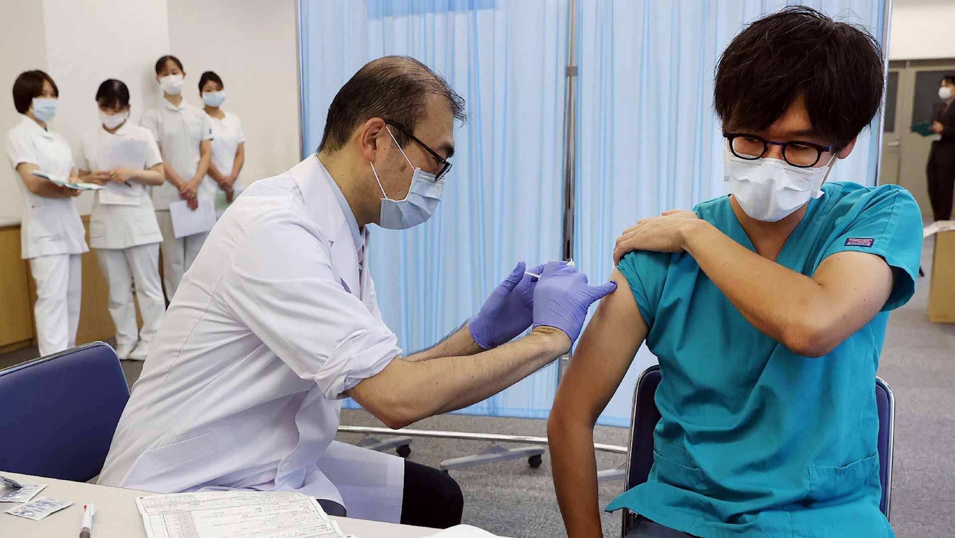 Image for the title: Tokyo's daily COVID-19 cases rise to most since Sept 11 