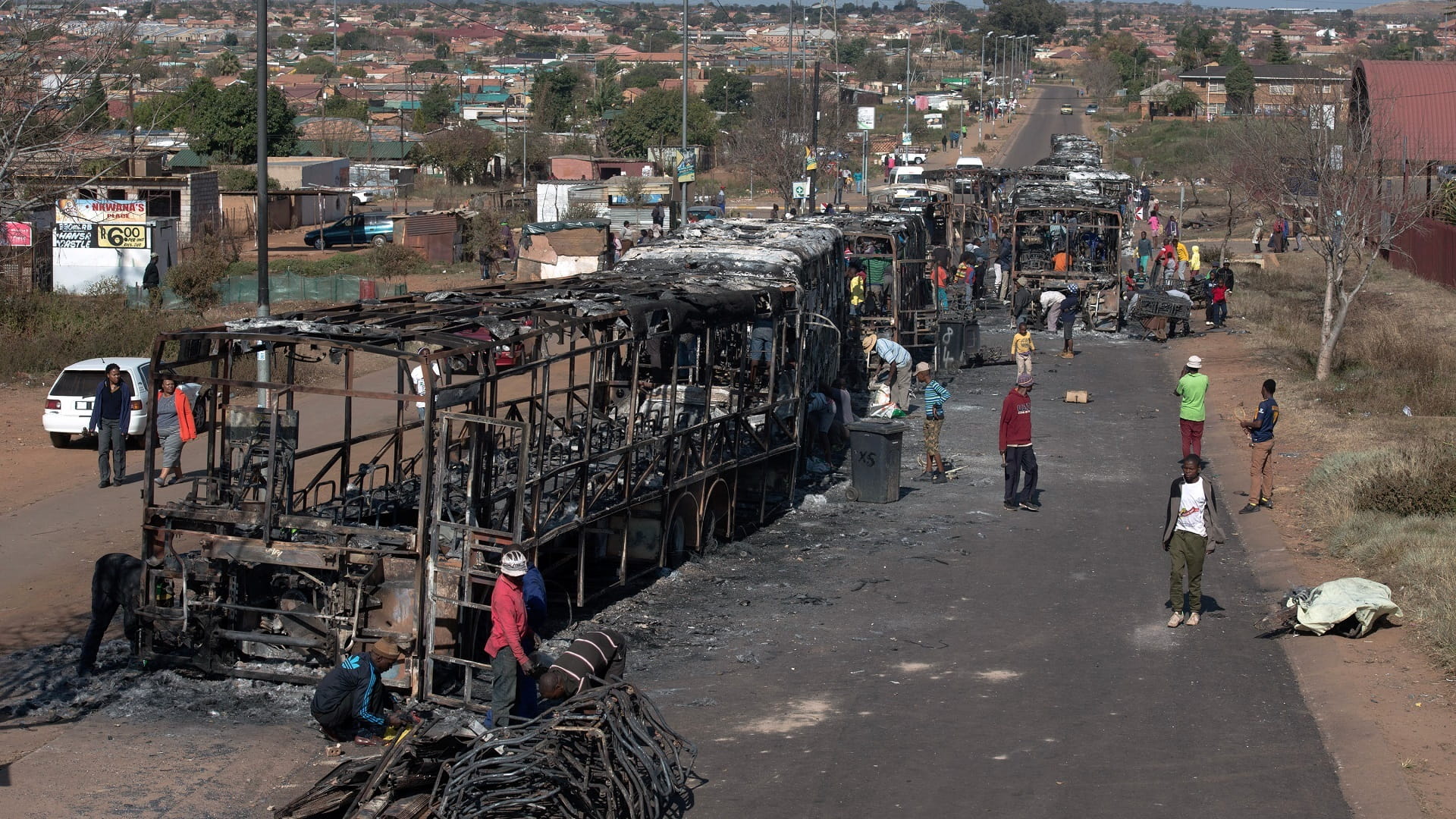 Image for the title: 16 burnt to death in South Africa mini-bus crash 