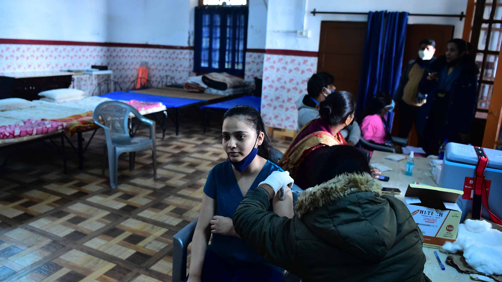 Image for the title: India's daily COVID-19 cases rise by 247,417, highest since May 