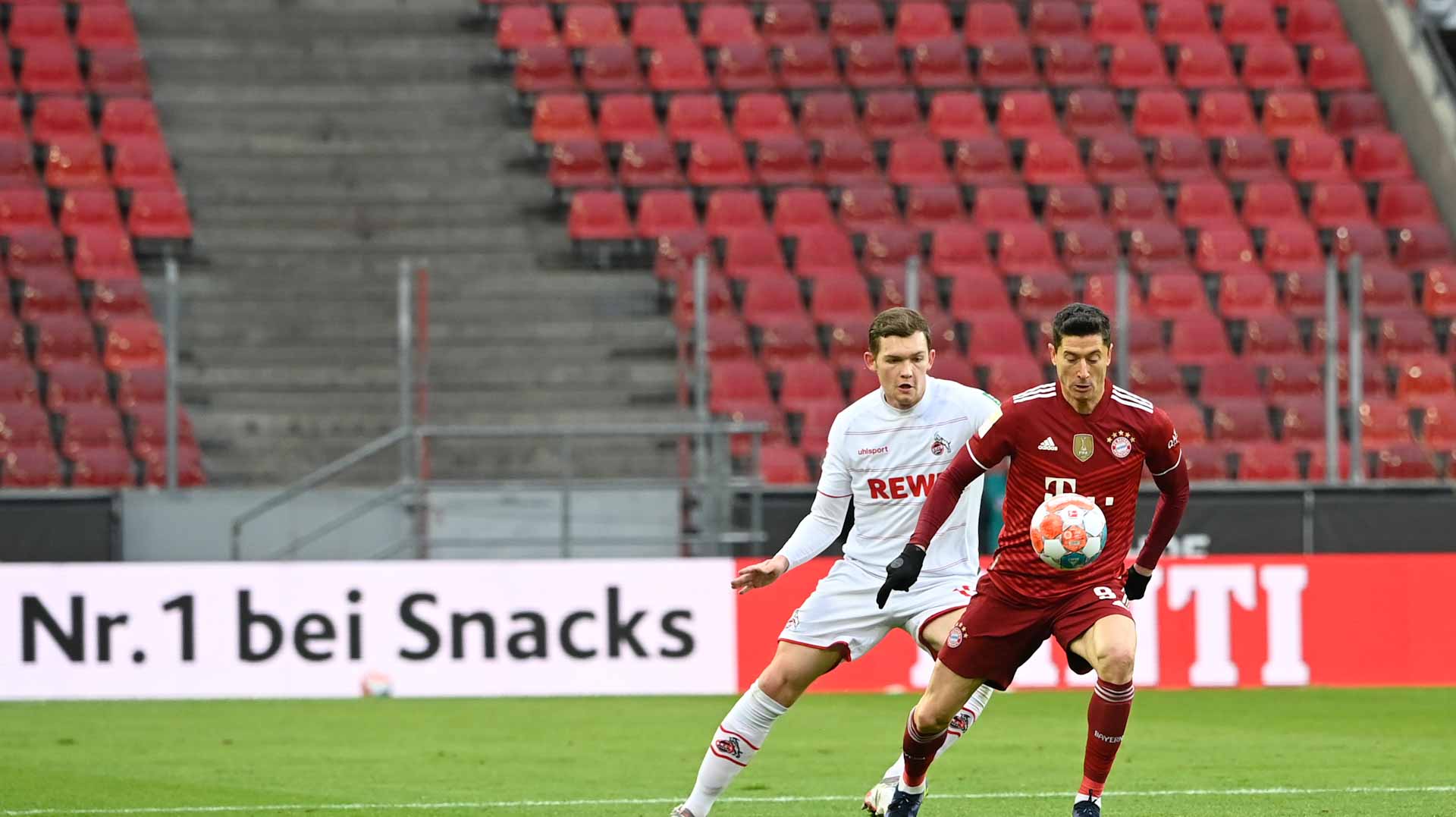 Image for the title: Lewandowski scores 300th Bundesliga goal as Bayern rout Cologne 