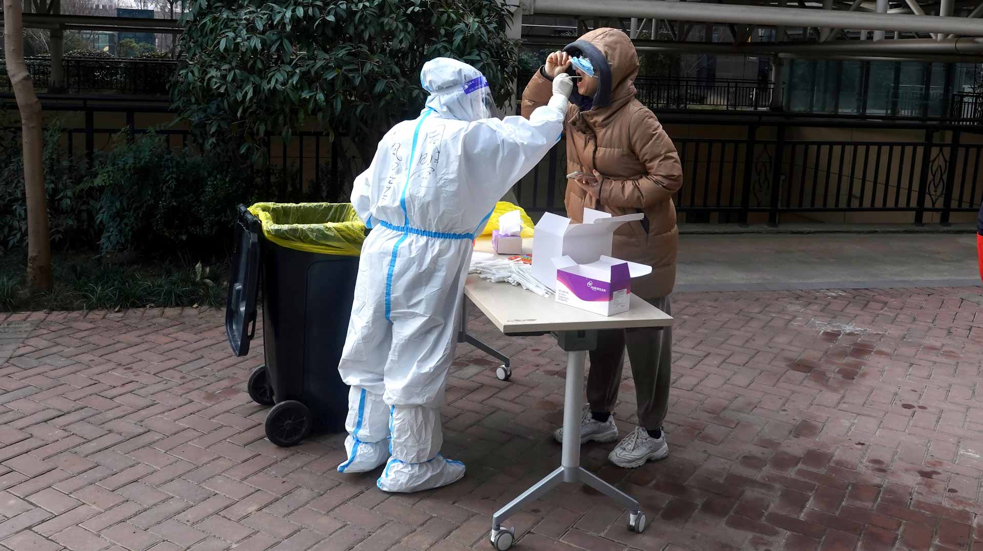 Image for the title: China virus cases highest in nearly two years 