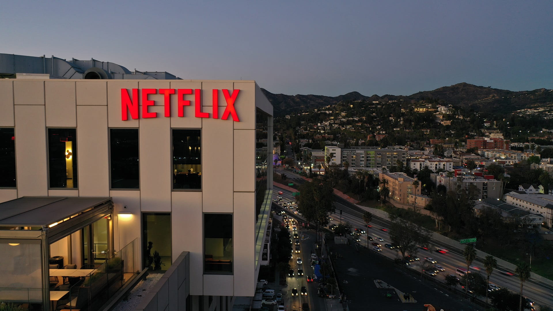 Image for the title: Netflix stung by slowing subscriber growth 