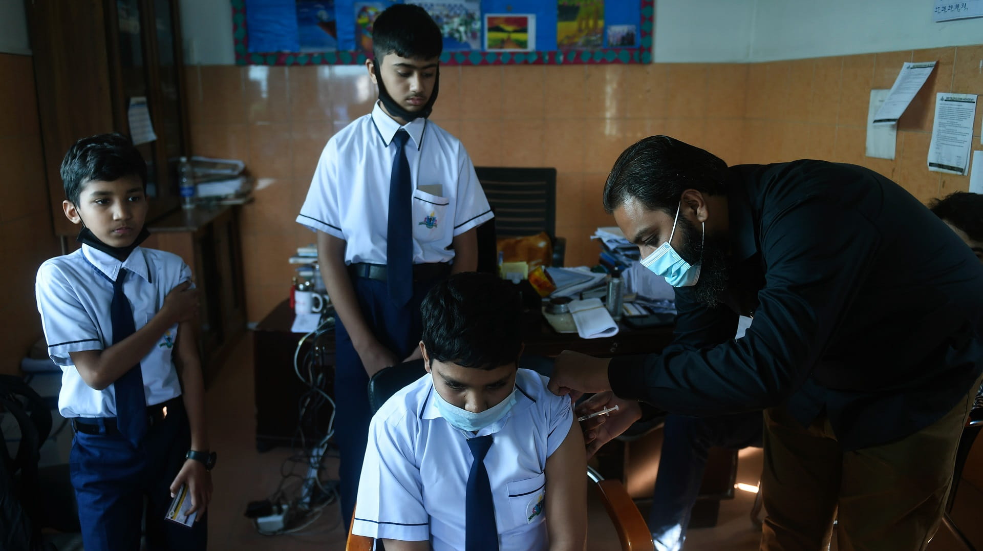 Image for the title: Pakistan records most daily COVID cases since pandemic began 