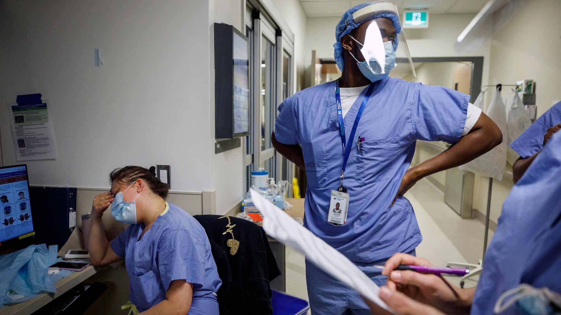 Image for the title: Canadian hospitals strain as Omicron hits health workers 