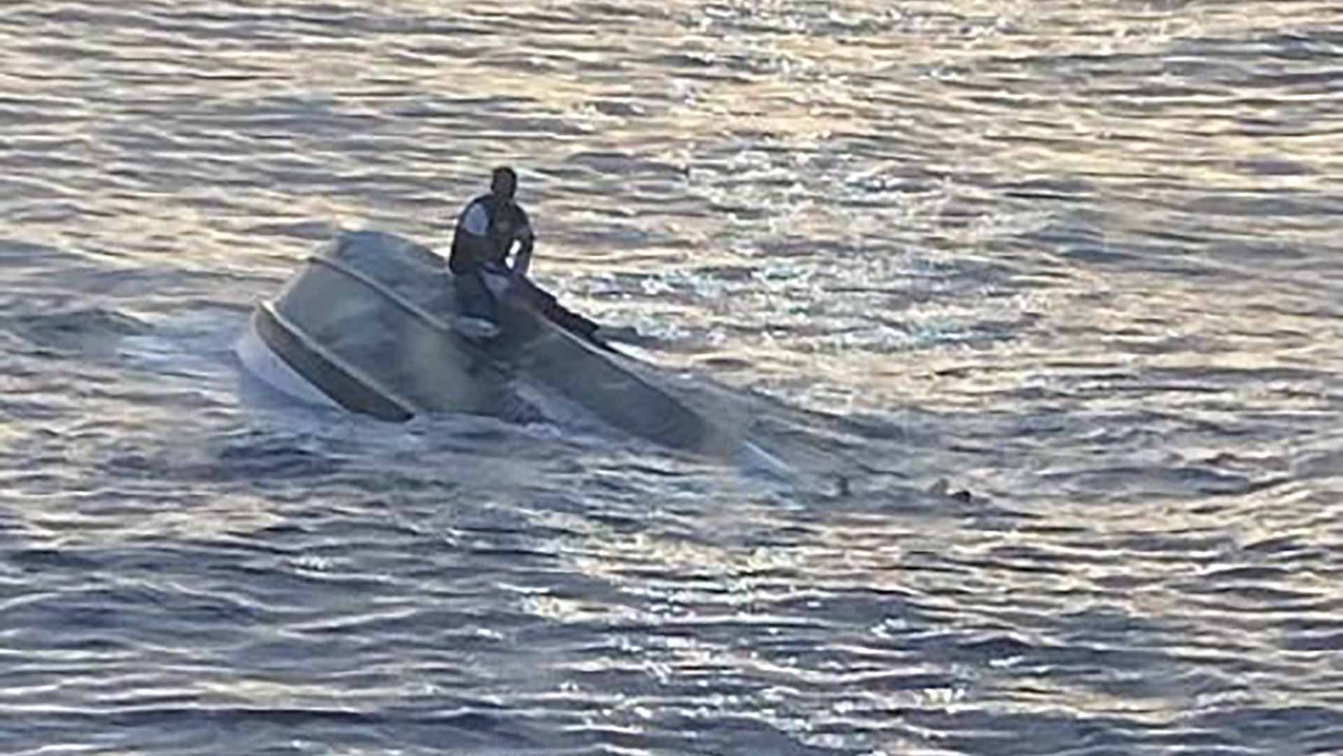 Image for the title: Dozens of people missing after boat capsizes off Florida 