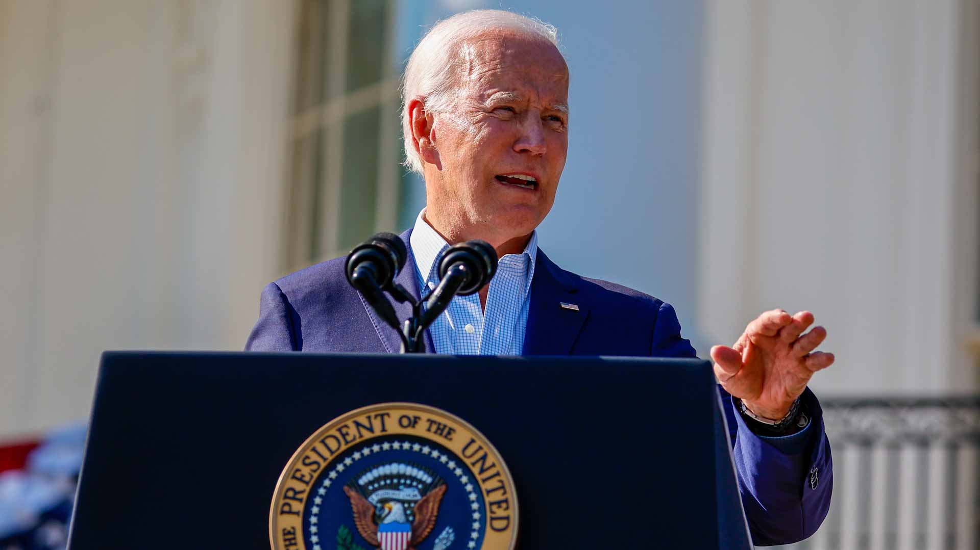 Image for the title: Biden tries to sound upbeat on July 4 despite mass shooting 