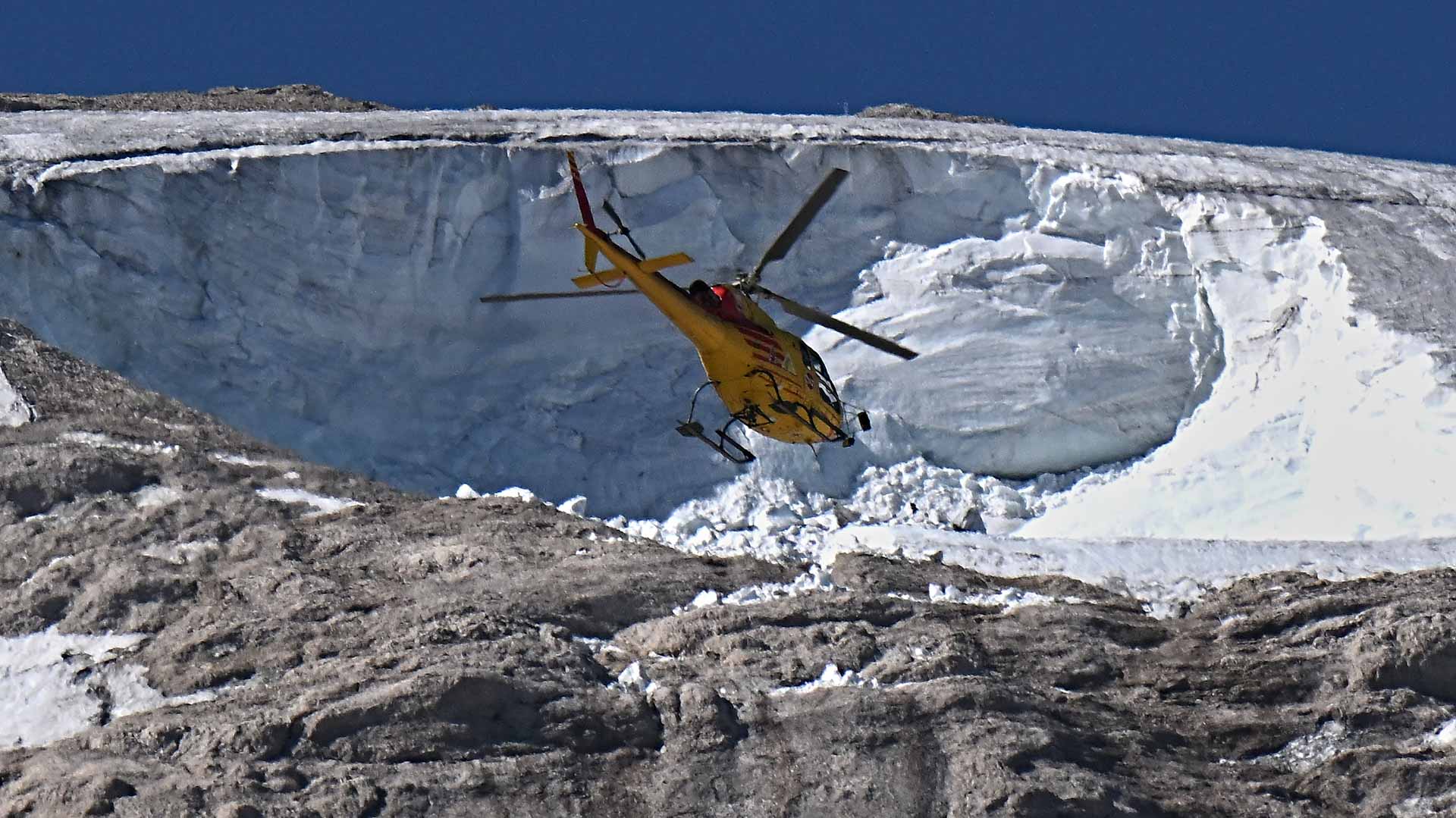 Image for the title: Death toll rises to nine in Italy glacier collapse 