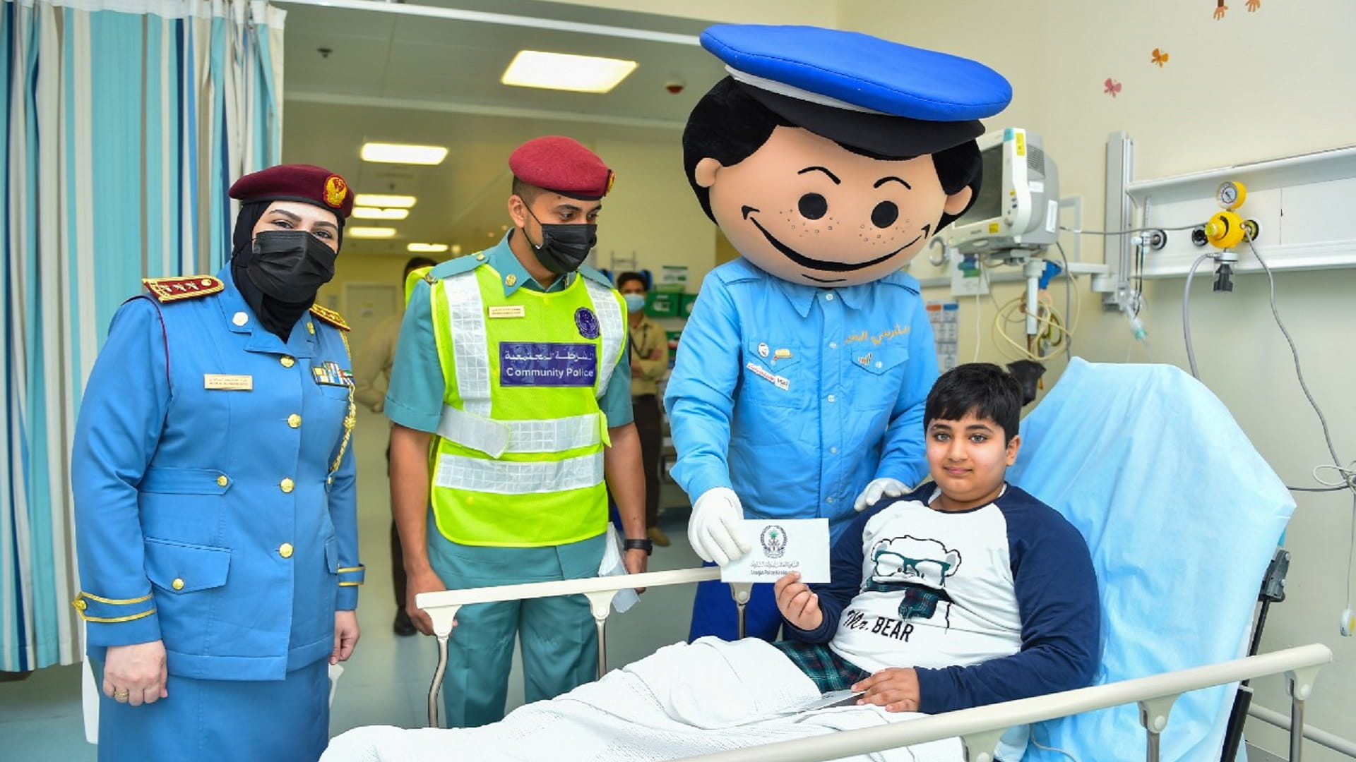 Image for the title: Sharjah Police draws a smile on children's faces 