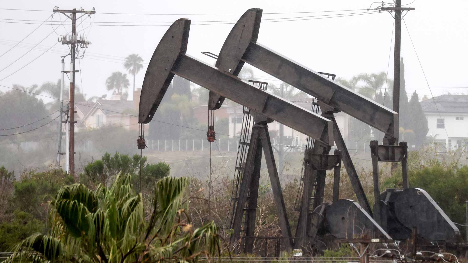 Image for the title: Oil slides as renewed China COVID curbs temper fuel demand outlook 