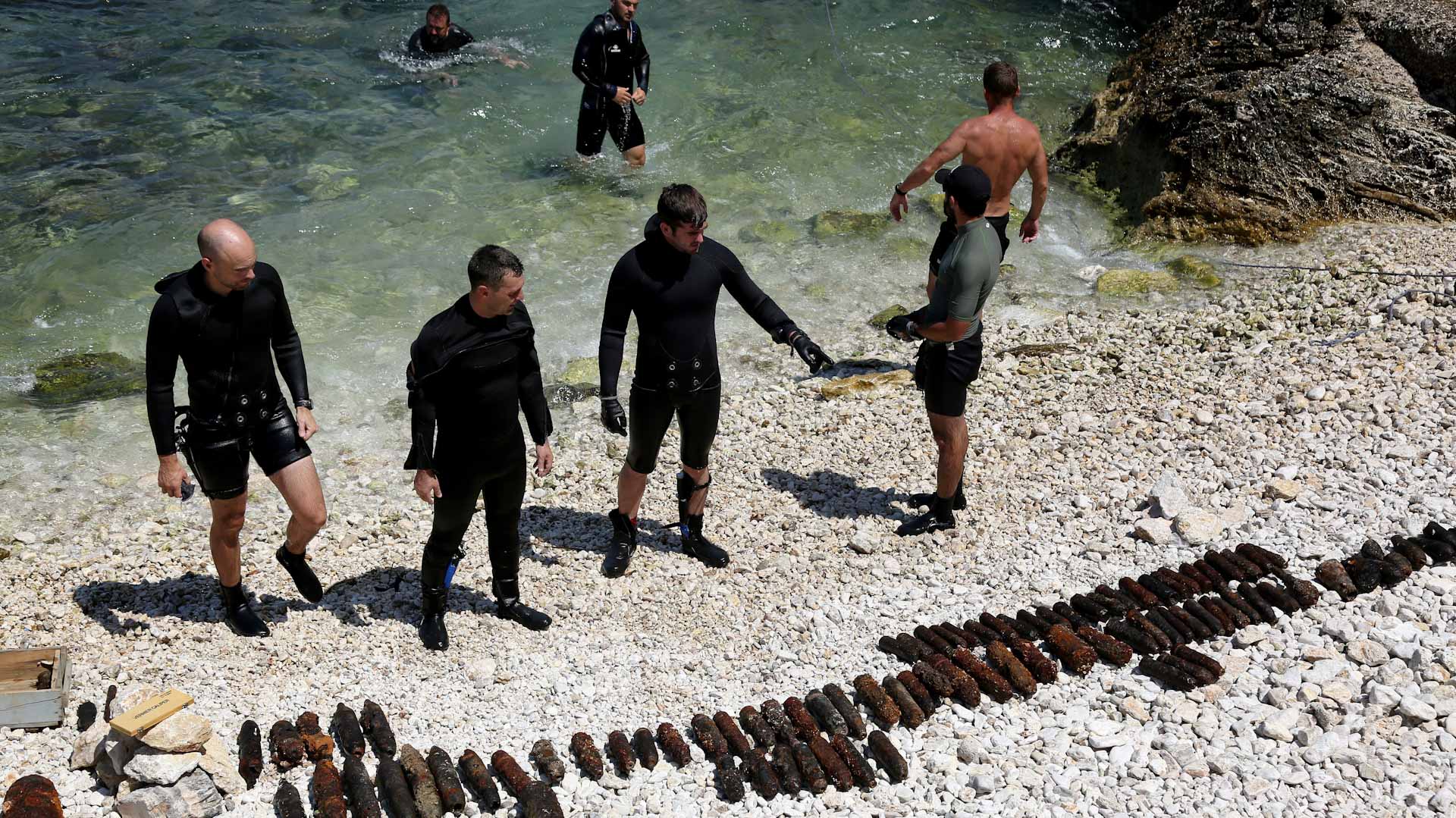 Image for the title: In Albania, divers fish for WWII bombs 