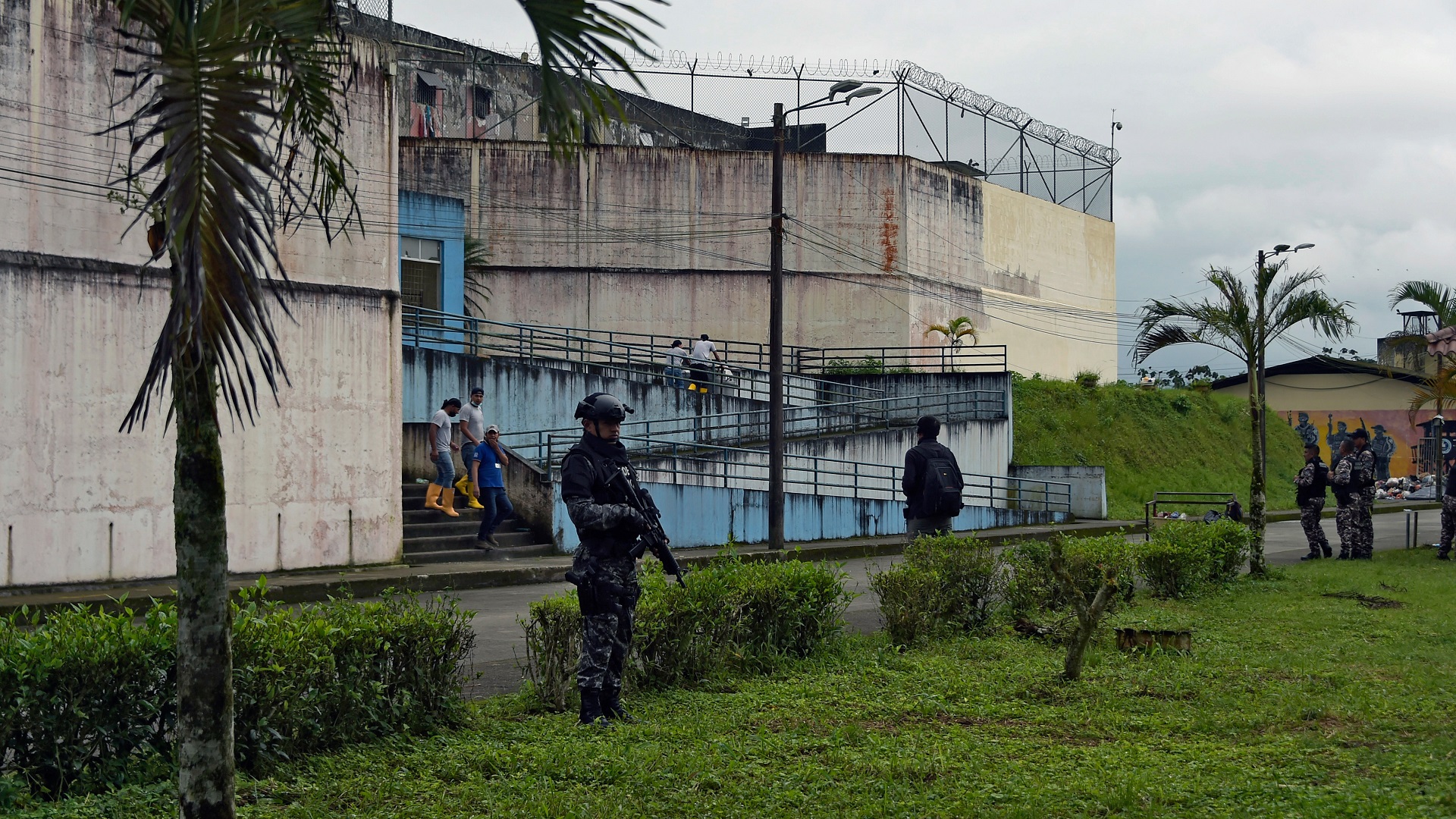 Image for the title: 13 inmates killed in fresh fight in Ecuador prison 