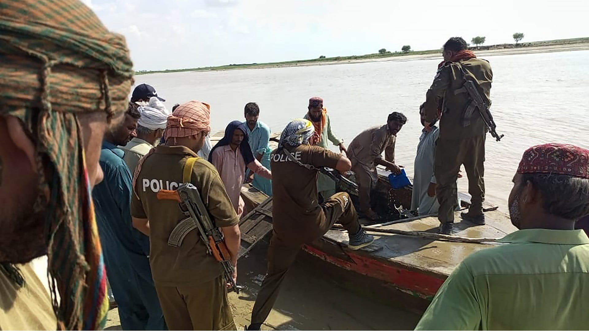 Image for the title: 20 drown as 2 boats capsize in Indus River in Pakistan 