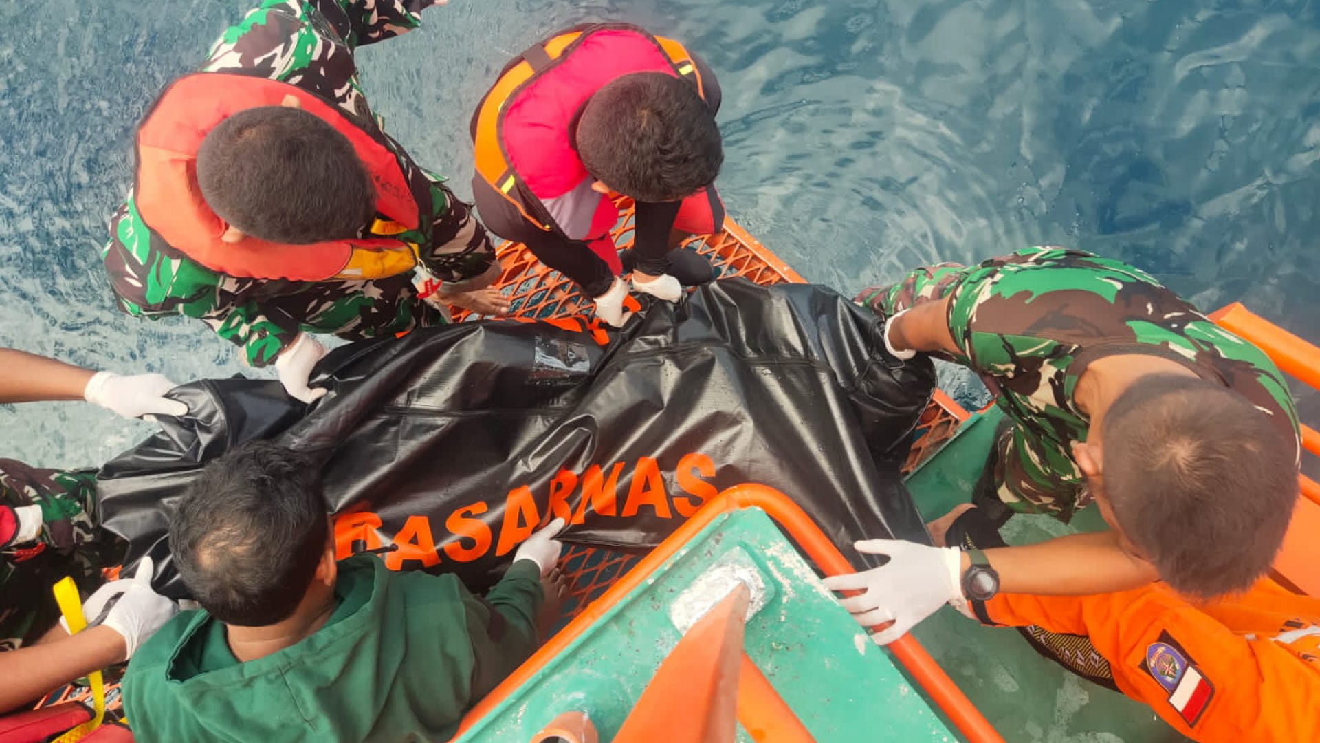 Image for the title: Nine dead after ferry sinks in Indonesia 