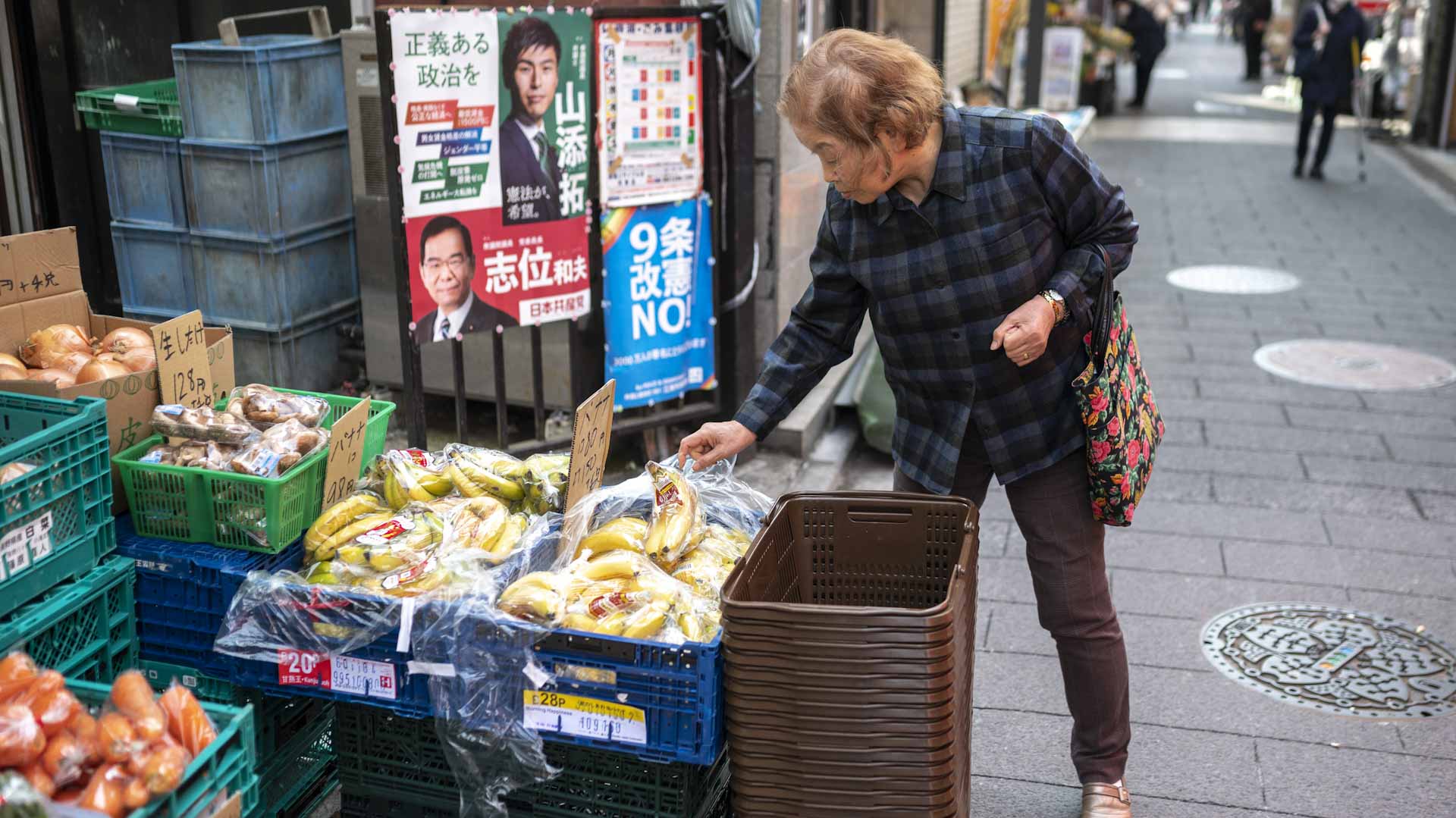 Image for the title: Japan raises economic view, signals broader recovery 