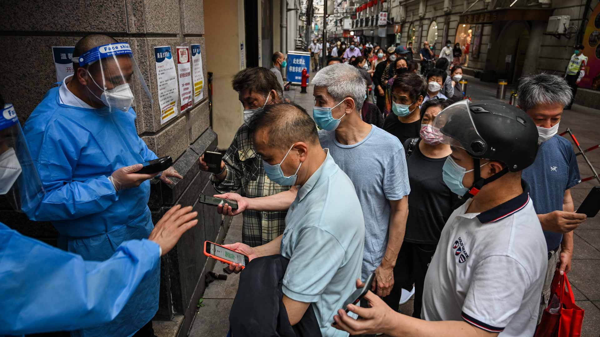 Image for the title: In Shanghai, lockdown blues make way for COVID testing gripes 