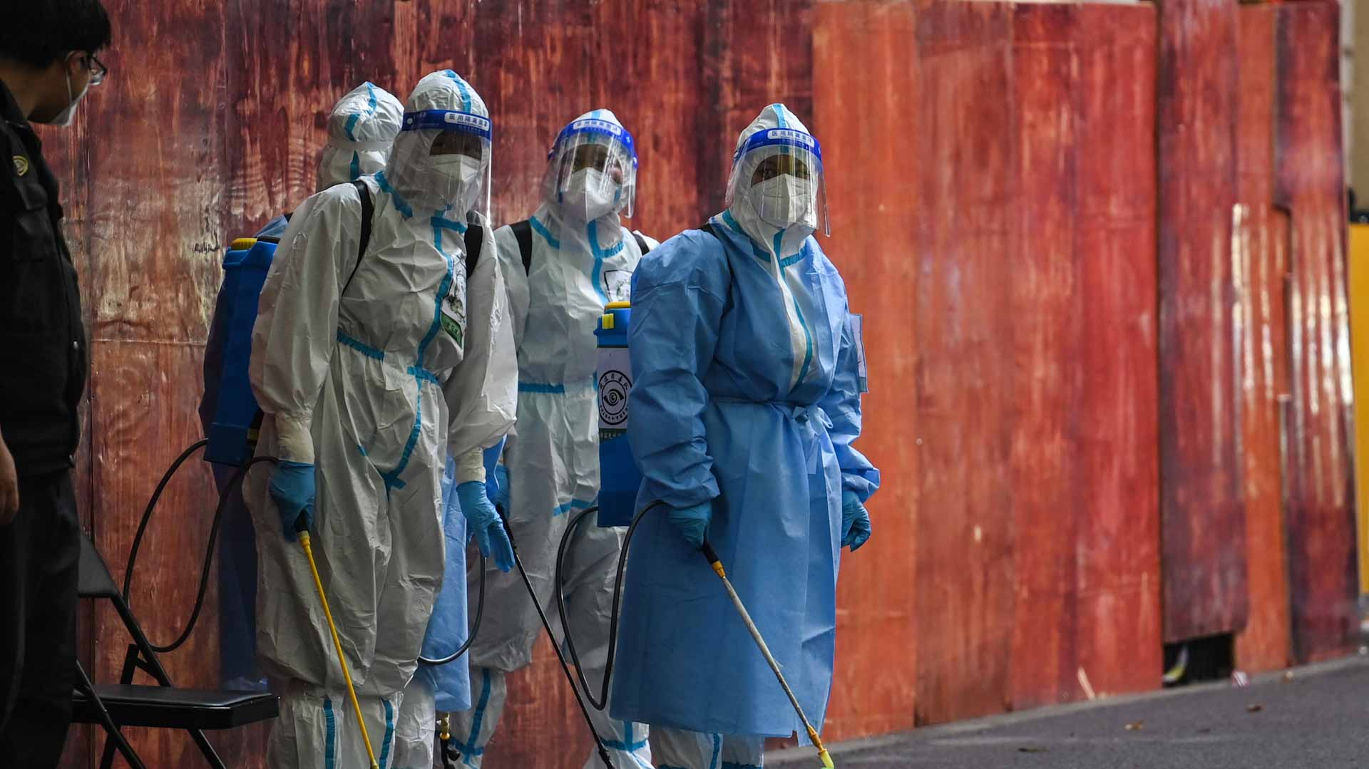 Image for the title: Beijing to reopen schools and workplaces as Covid-19 curbs ease 