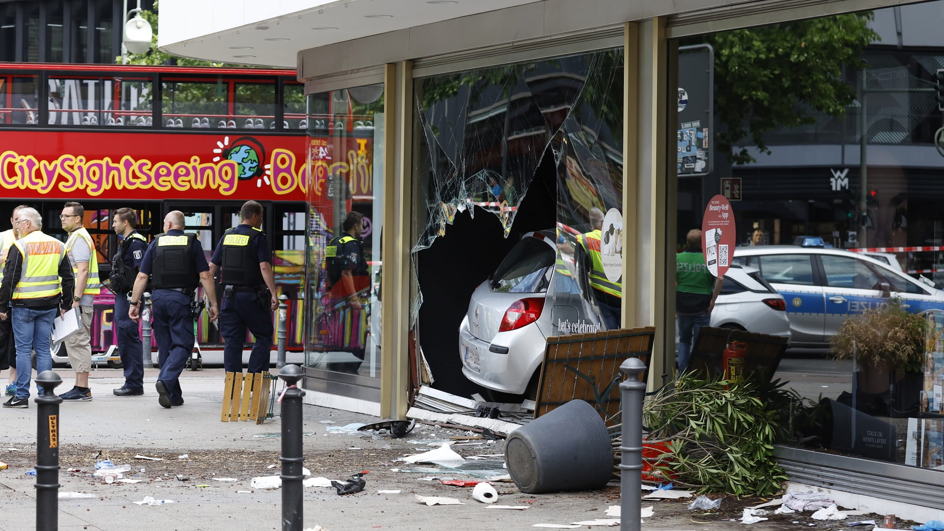 Image for the title: Car drives into crowd on Berlin shopping street, one dead 